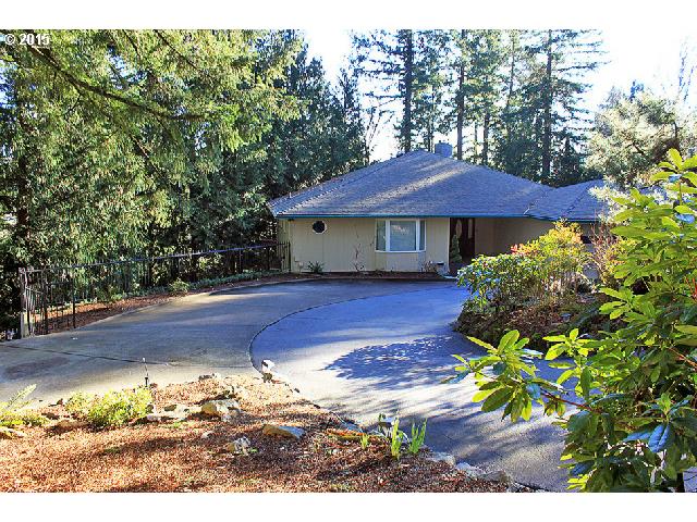 9440 MALCOLM GLEN ST SW Portland, Oregon Beautifully remodeled home-like a tree house! Spectacular huge open living room-Floor to ceiling walls of windows looking out on bright forest below-Gas fireplace+ Dining w/wood floor. Kitchen is gorgeous-High quality cabinets-Granite-Maple floor-Bright covered deck-Gas range! Huge Master suite w/den-could be bedroom! Family room is like living room-Huge-Spectacular windows-Fireplace! Bonus wired/plumbed 2nd kitchen. Lower Basement-shop