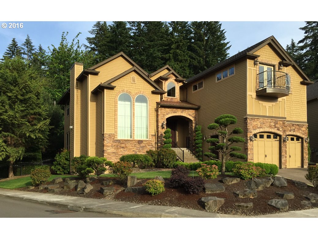 16345 DEER MEADOW LOOP SE Happy Valley, Oregon Beautiful custom home-All high end finishes-Its a 10! Lots of character & charm wArches-Wide Crown Molding-Travertine floors-Wrought iron balconies overlooking living-entry & view! Living room has vaults-2 story arched windows-Fireplace+ iron balcony! Kitchen has granite counters & high end stainless appliances. Dining h/Slider to deck+ beautifully landscaped private yard. Master suite is gorgeous. One of the prettiest homes I've seen!