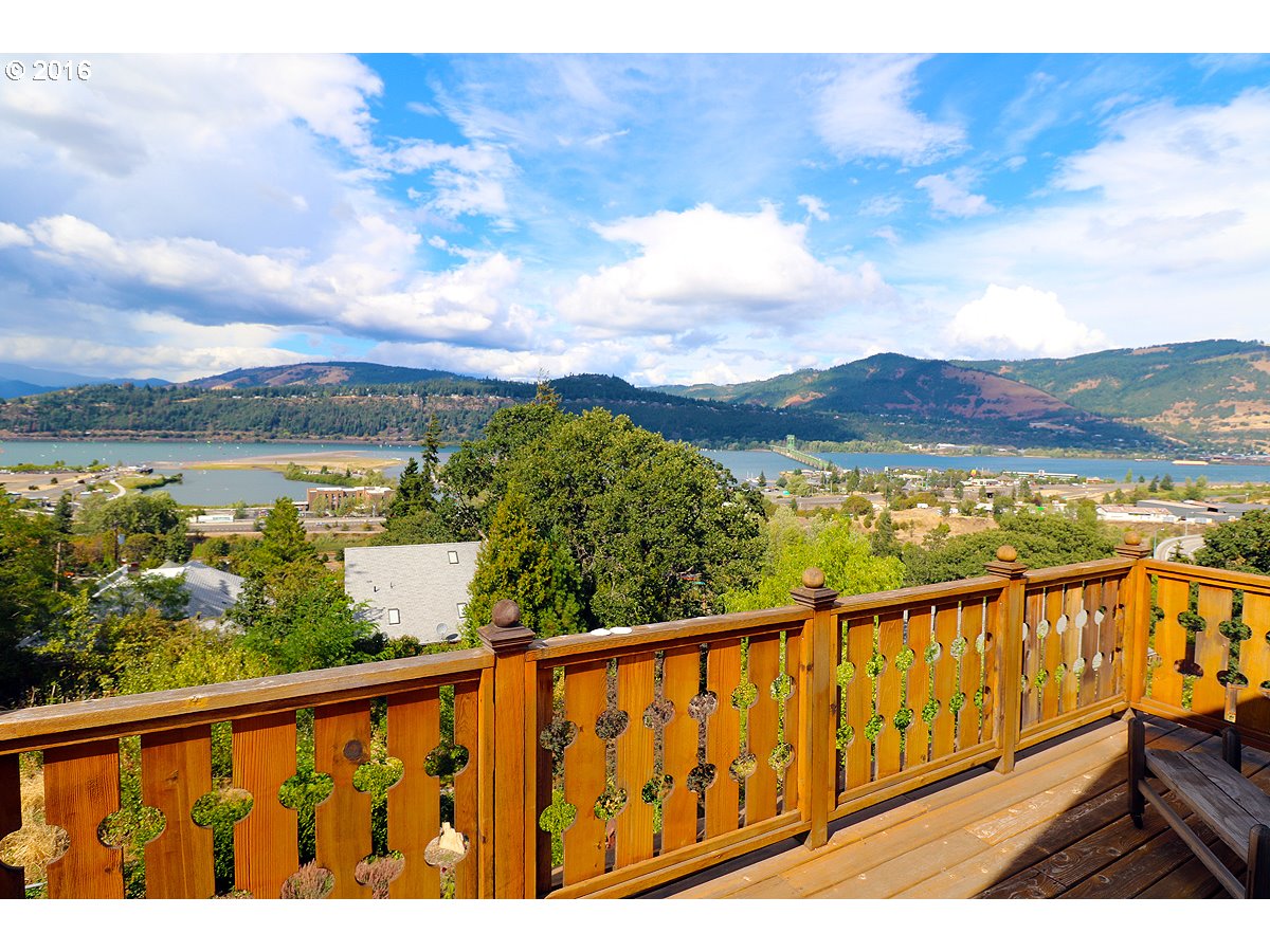 2 EUGENE Hood River, Oregon Spectacular 180 degree view of Columbia River & mountains-Watch the wind surfers! Just 4 min walk to downtown. Beautifully restored 1906 Craftsman home w/charm & character intact-spectacular views from main floor & master! Original wood floors main floor & up-formal dining room-sunroom off kitchen-3 remodeled bathrooms! Lot is over half an acre-Possible 6 view condo-townhomes-Do due deligence- Keep house & build 2 additional homes below