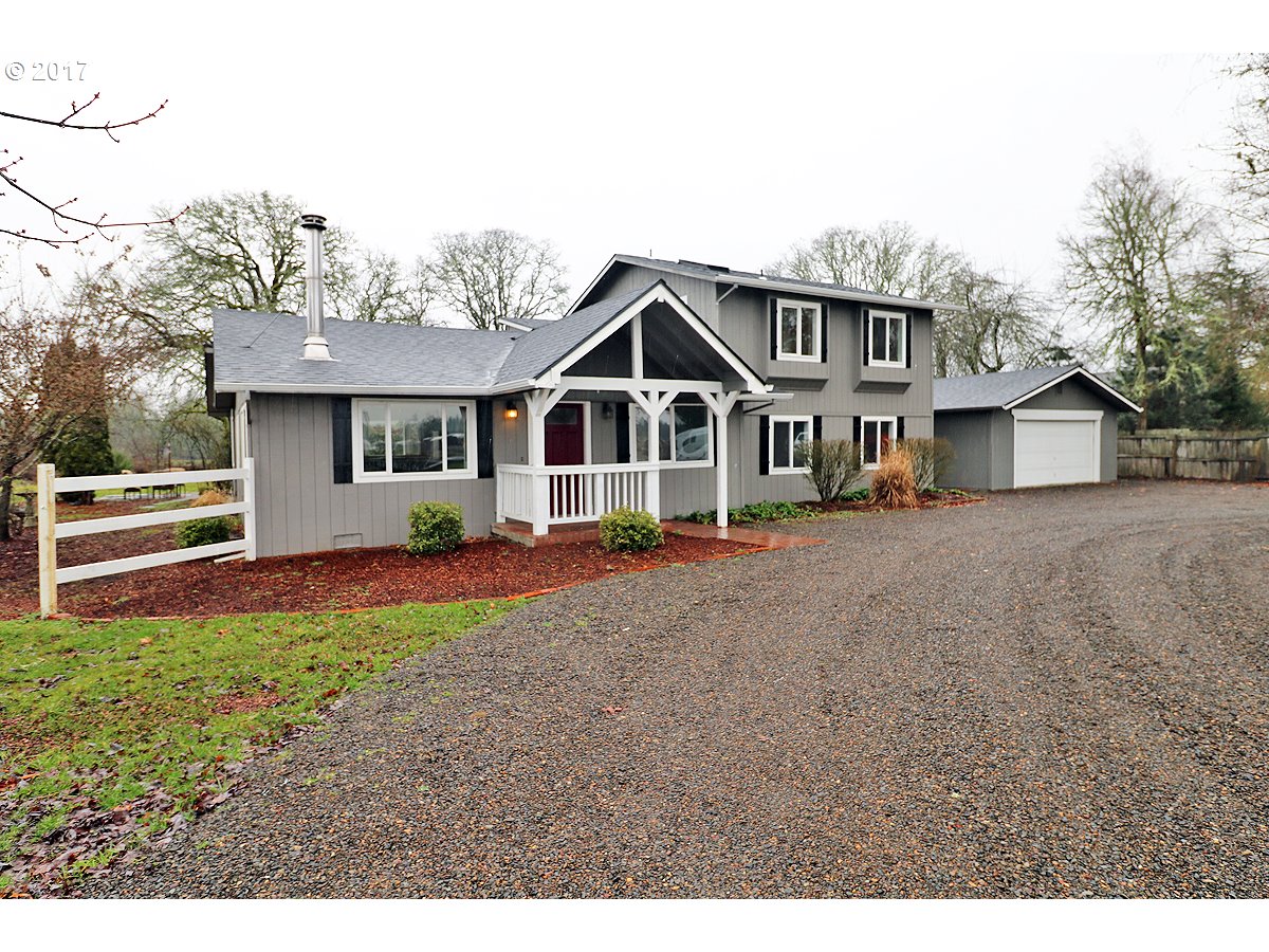 23861 KNIGHTS BRIDGE RD S Canby, Oregon Gorgeous remodeled mid century farmhouse sits way back from road on 1.3 acres w/fields, garden & white fence. Huge bright sunny great room has hardwood floors, woodstove, lots of big new windows, french doors to patio & back yard. Open kitchen w/vaults & beams! Kitchen is beautiful w/high end gas range-Stainless appliances & Eat Bar. Master suite upstairs is spectacular! 3 more bedrooms on main + bonus. Land is usable and flat!