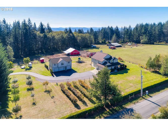 38011 NICHOLS HILL RD SE Washougal, Washington This Premier Horse and Hobby farm is a family's dream come true. It has been a featured hobby and horse farm in Farm and Ranch Living Magazine. The property boasts a 3 stall luxury barn and round pen. Additionally there resides a 2 bedroom guest home above a spacious 3 car shop. Beautiful rolling hills views, with nearby babbling streams and berries. Orchard and Vineyard on property. Trees across private street included with property.