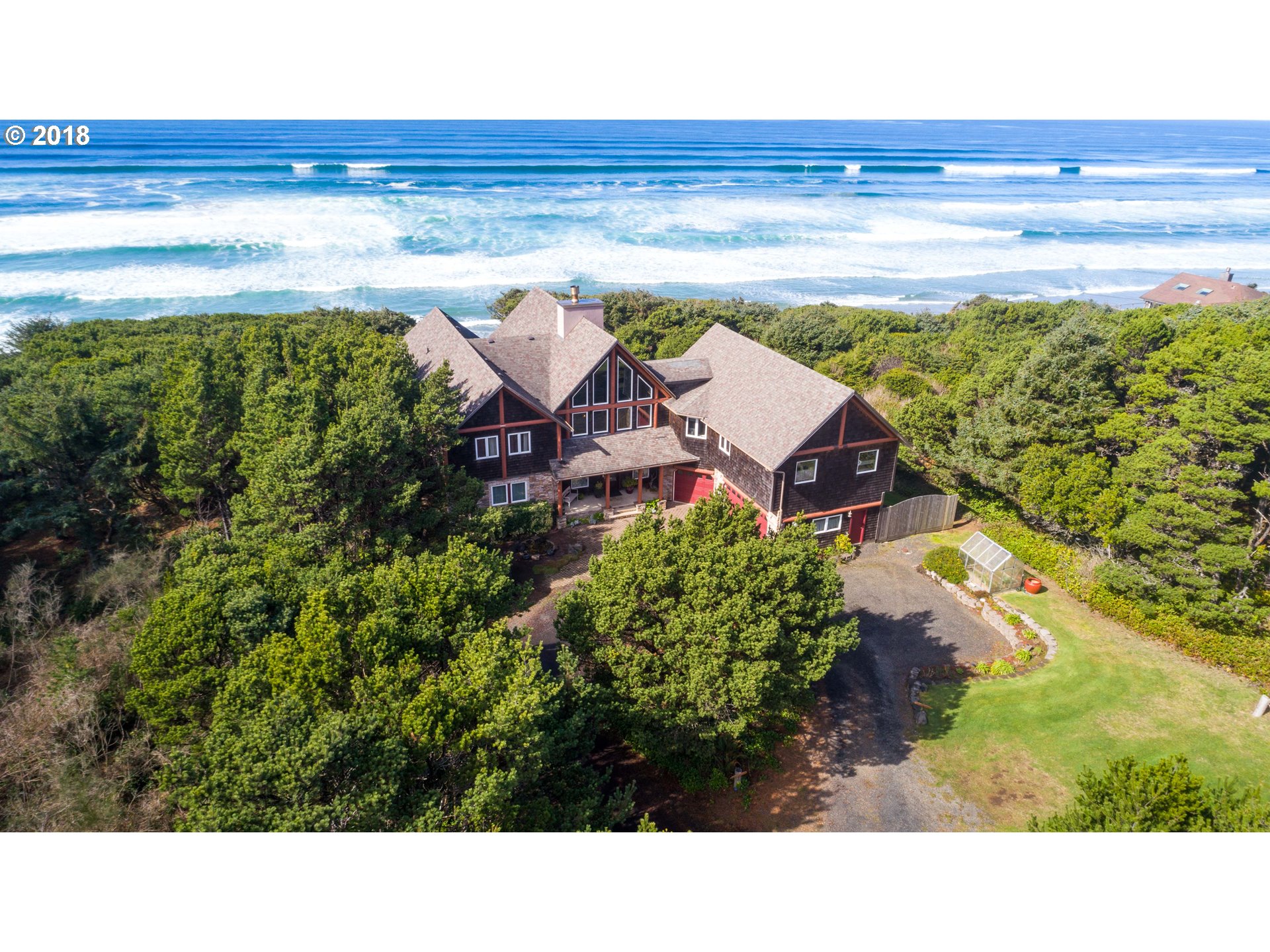 9556 COAST HWY S South Beach, Oregon Remarkable 4,057 sq ftprivate South Beach estate just south of Newport, OR. Perched cliffside overlooking the Pacific Ocean with 4 bdrms & 4.5 bths Huge cathedral windows, soaring ceilings, rustic log accents, floor to ceiling wood-burning fireplace and gorgeous outdoor spaces incl. covered atrium & lush lawn. Pro gourmet kitchen. Ideal destination for family & friends rain or shine. Martha Stewart 5 star wedding venue and blissful B&B.