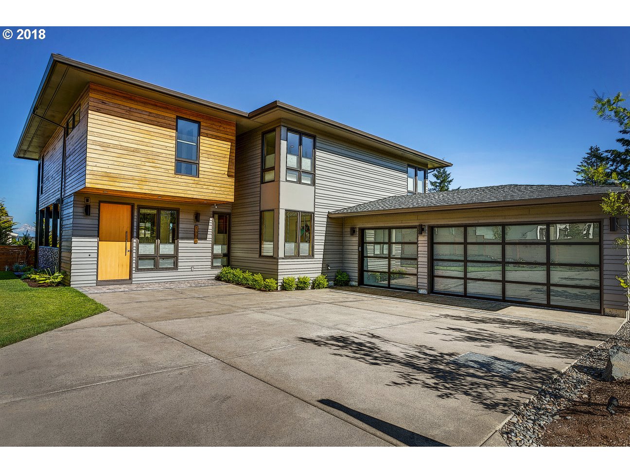 1956 HIGHLANDS LOOP Lake Oswego, Oregon Brand new Price reduced 167,000 Forest Highlands/2015 Street of Dreams neighborhood in Lake Oswego. 21st Century Modern design with clean lines, large windows & open spaces. Four bedrooms including two master suites, five baths and home theater. Sleek, modern kitchen with Miele appliances and quartz counters. Wrap-around patio with outdoor kitchen and covered & open areas for entertaining. Near LO High & Oswego Lake Country Club.