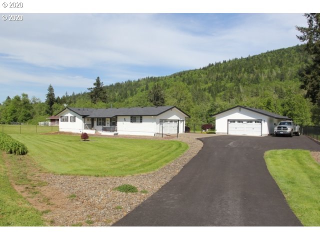 Wake up to coffee or enjoy a glass of wine after work over looking the river from your back deck. Level, use-able ground, 2 stall livstk barn, extra 2 car detached garage/SHOP w/220 for all your hobbies. New roof & gutters on home, shop, barn, & mower shed. Updates to home include bthrms, kitchen, heat pump, certified wood-stove, bamboo flooring, SS appliances,interior paint,vinyl windows, nice blinds, water heater, garage doors & openers, & carpet. Fully fenced country living close to town