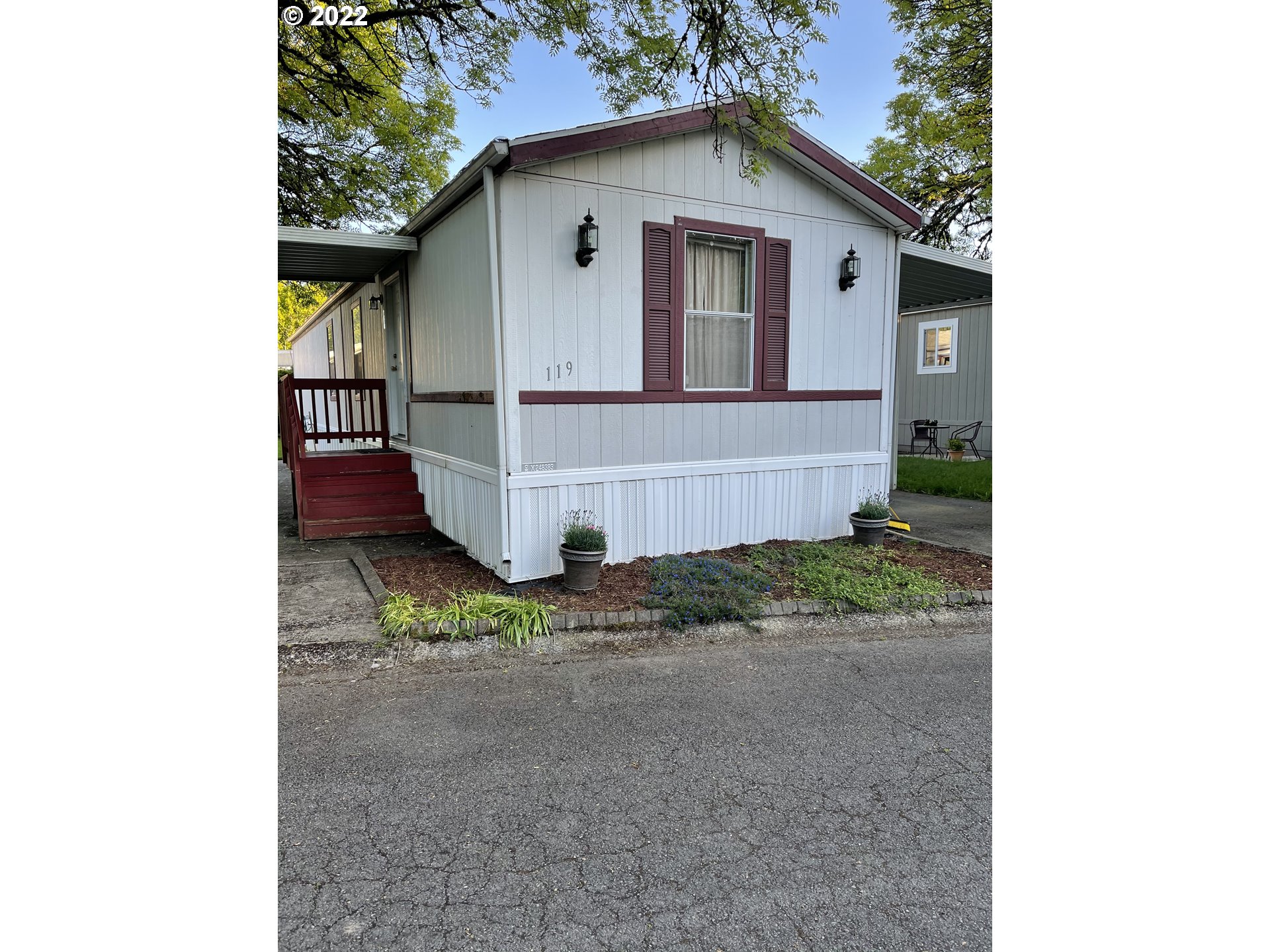 Estate transfer, sold 'as is' and priced to sell.Separation of space w/one bedroom & bath at front and master & bath on back end of home. Kitchen/dining/living room combo.  Golden West mfg.Washer and Dryer incld. Buyer must be approved by Park Manger, Brenda: 541 343-0111.  Park amenities: community building for gatherings and family events; library and post office building; seasonal pool.  Rent includes trash collection.  Convenient location with park on busline. Seller will look at all offers.