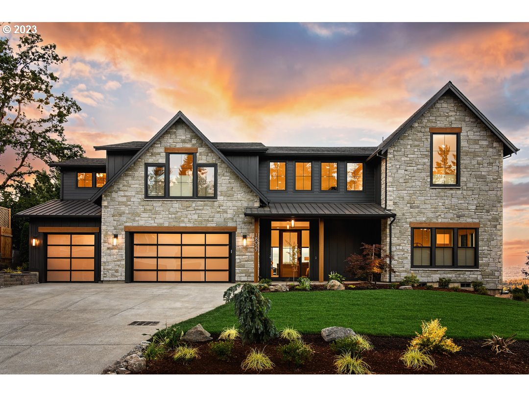 Proudly presented by the winning most Home Builder of ALL Street of Dreams; with 54 individual awards and 9 Best of Show Honors, this Street of Dreams quality home in Lake Oswego has an oversized homesite with 21,072 square feet, almost a half-acre; an incredible location with views of Mt. Hood, Rainier, Mt. St. Helen and the river valley.  The home offers a spacious guest suite on the main floor with a walk-in closet and suite bath. There's also an Office/Den on the main floor with an adjacent powder bath.  The eat-in kitchen has professional quality Wolf-SubZero and Monogram appliances, including a 48-inch refrigerator and 48-inch gas cooktop, polished Silestone countertops, decorative tile backsplash and locally crafted cabinets that extend all the way to the 10-foot ceilings. The adjacent Kitchen alcove has one of the two under-counter wine storage centers and leads to the built-in BBQ area (with built-in BBQ, refrigerator and electric, ceiling mounted heat). The vaulted great room, with a contemporary style gas fireplace, has built-in cabinets on both sides and gives way to the 4 panel, Stacking "Glass-Wall" slider which leads to the oversized outdoor covered living area with a second fireplace, skylights and 2 electric ceiling mounted heaters. Enjoy the year-round use of this wonderful space. The Primary Bedroom suite will be your personal in-home spa with heated tile floors in the bathroom, a heated towel rack, an oversized soaking-tub and designer tiled, clear glass, frameless shower. Rounding out the upstairs are 2 additional bedrooms, each with their own bathroom suite, plus a media room with wet bar, and a conveniently located laundry room. The home includes dual zone 95% efficient forced air heating, air conditioning and a natural gas whole home generator. Recent price improvement.