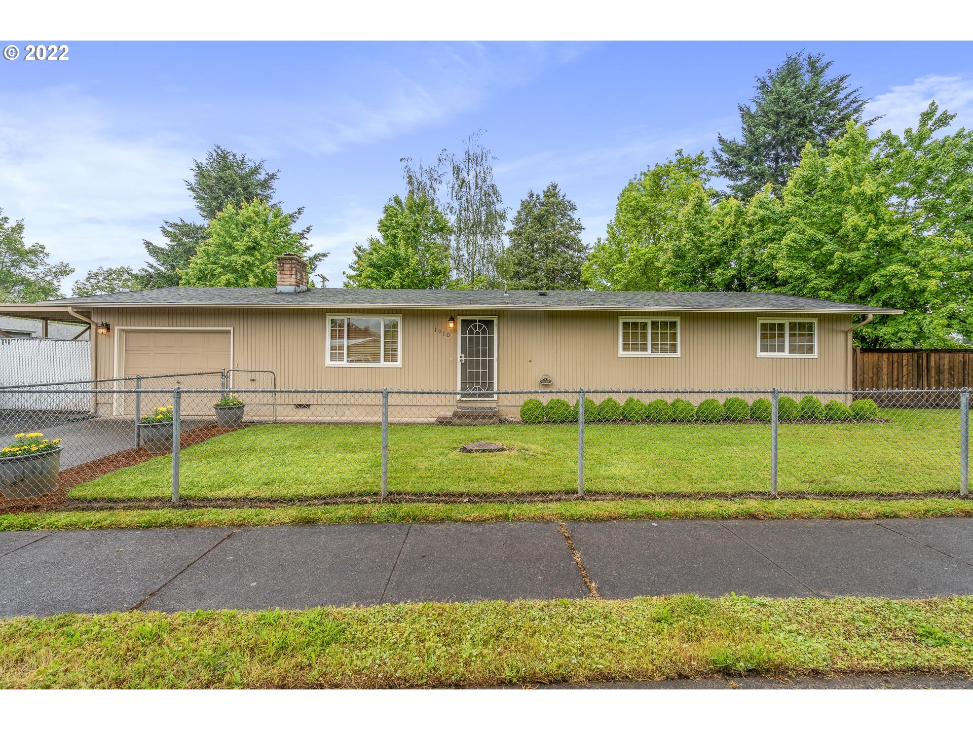 Hard to find 4 bedroom house under $375,000! Updated Kitchen with new tile backsplash. Private fenced back yard great for kids, pets and entertaining. This home is clean, solid and has been well cared for! Carport for small trailer or boat storage. Convenient location for shopping, schools, parks and Hwy 126. Energy efficient ductless heat pump easily heats and cools entire house.
