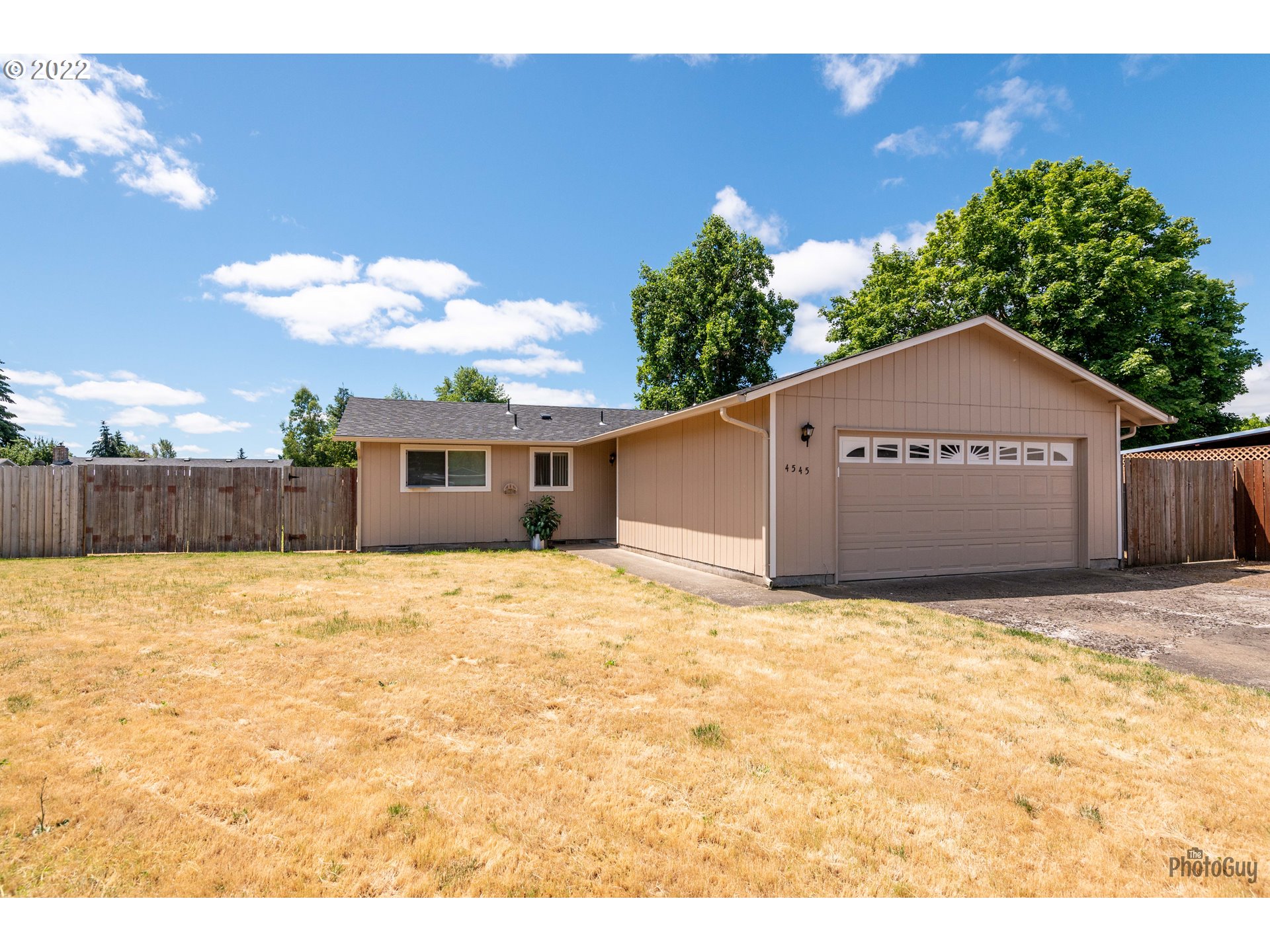 Here is your moment to own this Move-in ready, single level home in a quiet cul-de-sac with RV parking and a large-level lot.  Ductless heat pump, newer roof, new paint throughout, two car garage and all appliances included. This home has great sun exposure ideal for all of your urban gardening dreams.