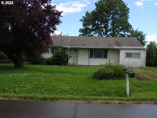 This property is 3 lots.  front lot zoned residential back two lots w/ garage/shop & garden room zoned light med. industrial. buyer to check with county on allowable uses. county records says 3 bedrooms but only 2 of the rooms have closets and 2 bonus rooms do not.  detached garage/shop is 1800 sqft per county. home needs a roof & updating. Sold AS-IS .buyer to do their due dilegence regarding all asspects ofproperty & allowable uses. fruit trees, irrigation well on property unknown if it works