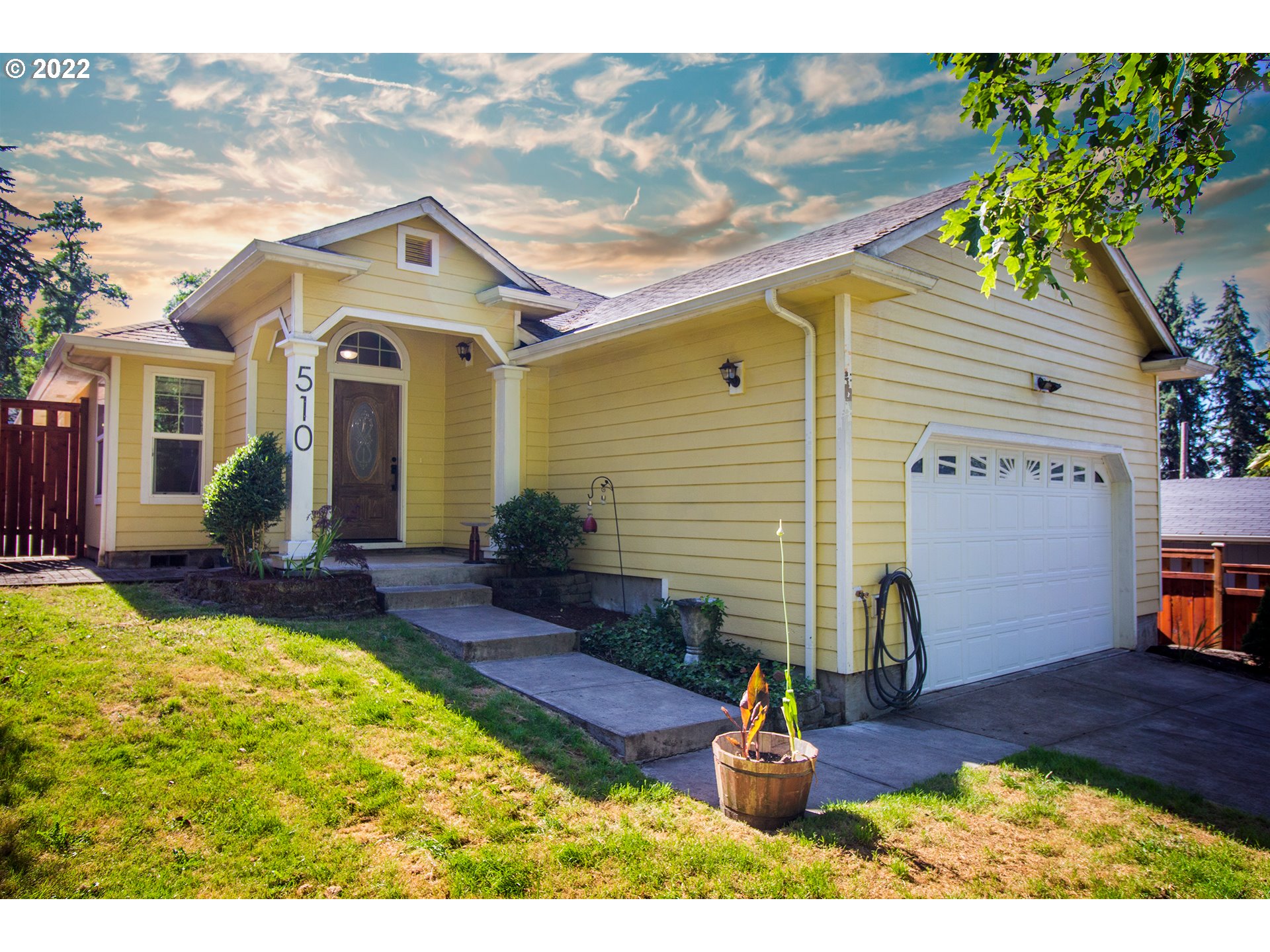 Newer construction located in a quiet neighborhood, walking distance to parks and downtown Springfield! Inside, enjoy vaulted ceilings, updated laminate (LVP) flooring, fixtures, SS appliances, and a large primary bedroom with private bathroom, his and her sinks and walk-in closet! Outside you'll find a newer covered patio, landscape improvements and new surrounding fence. Overlooking downtown, this home is close to it all, minutes from UO, and still offers private surroundings!