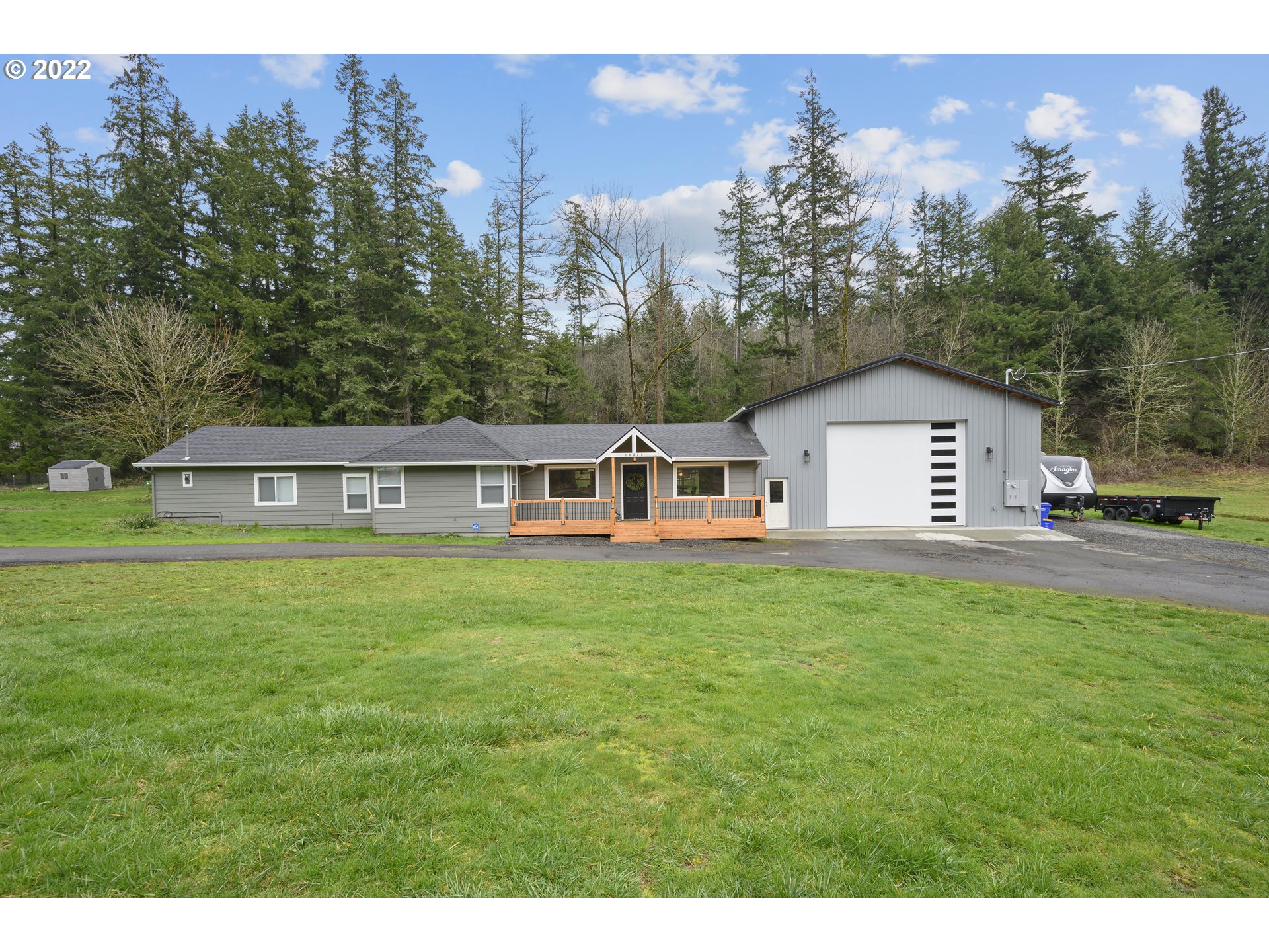Move in ready, updated 2015 square foot one-level home with newer attached approximately 1700 sq. ft shop. Home/Shop set up with 50 amp generator plug and 30 amp pug set up for your RV. approximately 1700 sq ft attached shop/garage. 2 acres of country living at its finest!