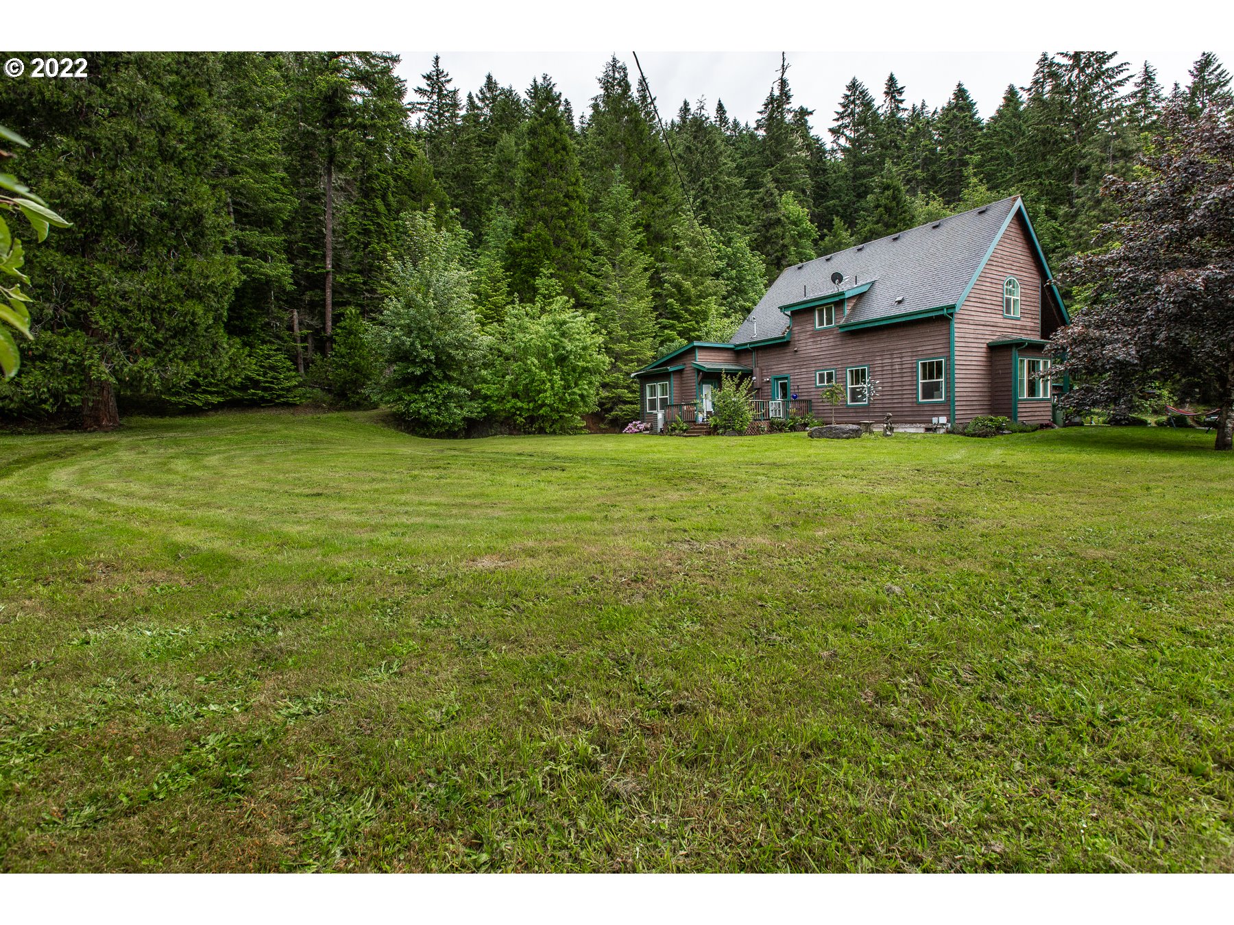 Country living within town amenities! Only minutes from Cottage Grove. This home features high speed internet & expansive outdoor space that offers garden beds, fire pit, utility shed, oversized detached garage, RV parking and freshly paved driveway. 10' ceilings, grand entrance finished w/ decorative alder beams, remodeled kitchen, main floor master w/spa-like bathroom. Large upstairs bedrooms featuring multi use closest's. Roof is scheduled to be replaced. Listing agent related to seller.