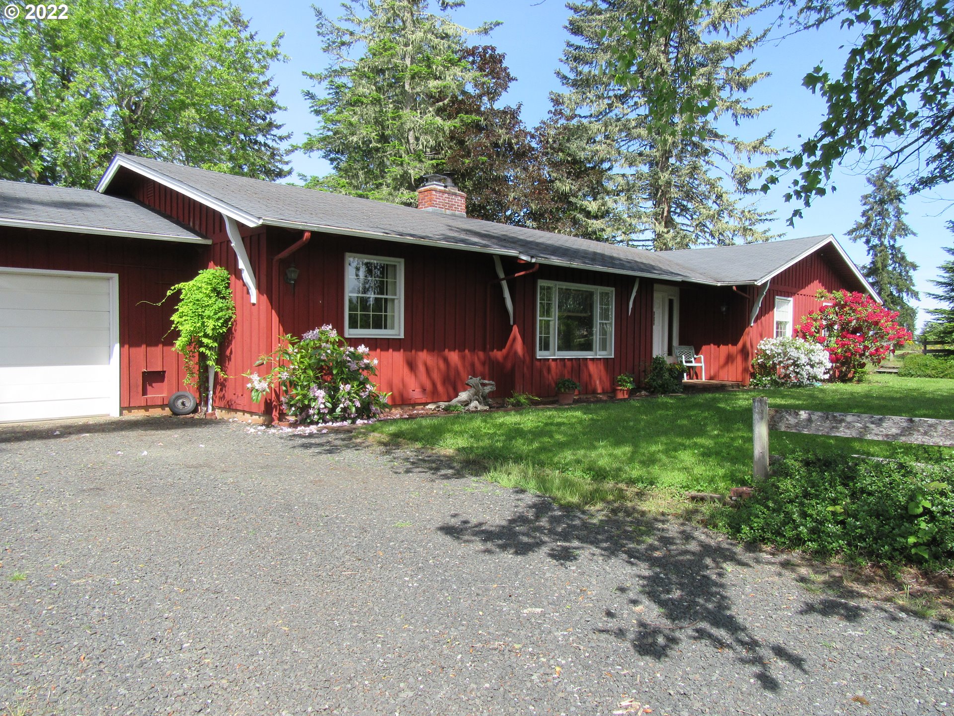 Don't miss this solid, comfortable, and cozy 3 bedroom, 2.5 bath custom built home on 18+ private acres with expansive views. The property has ample open space for gardening, animals, and play. Cell phone reception is good. High speed fiber optic internet service has been installed with Douglas Fast Net. A workshop and the laundry room both open to the large attached 2-car garage. Shown by appointment only.