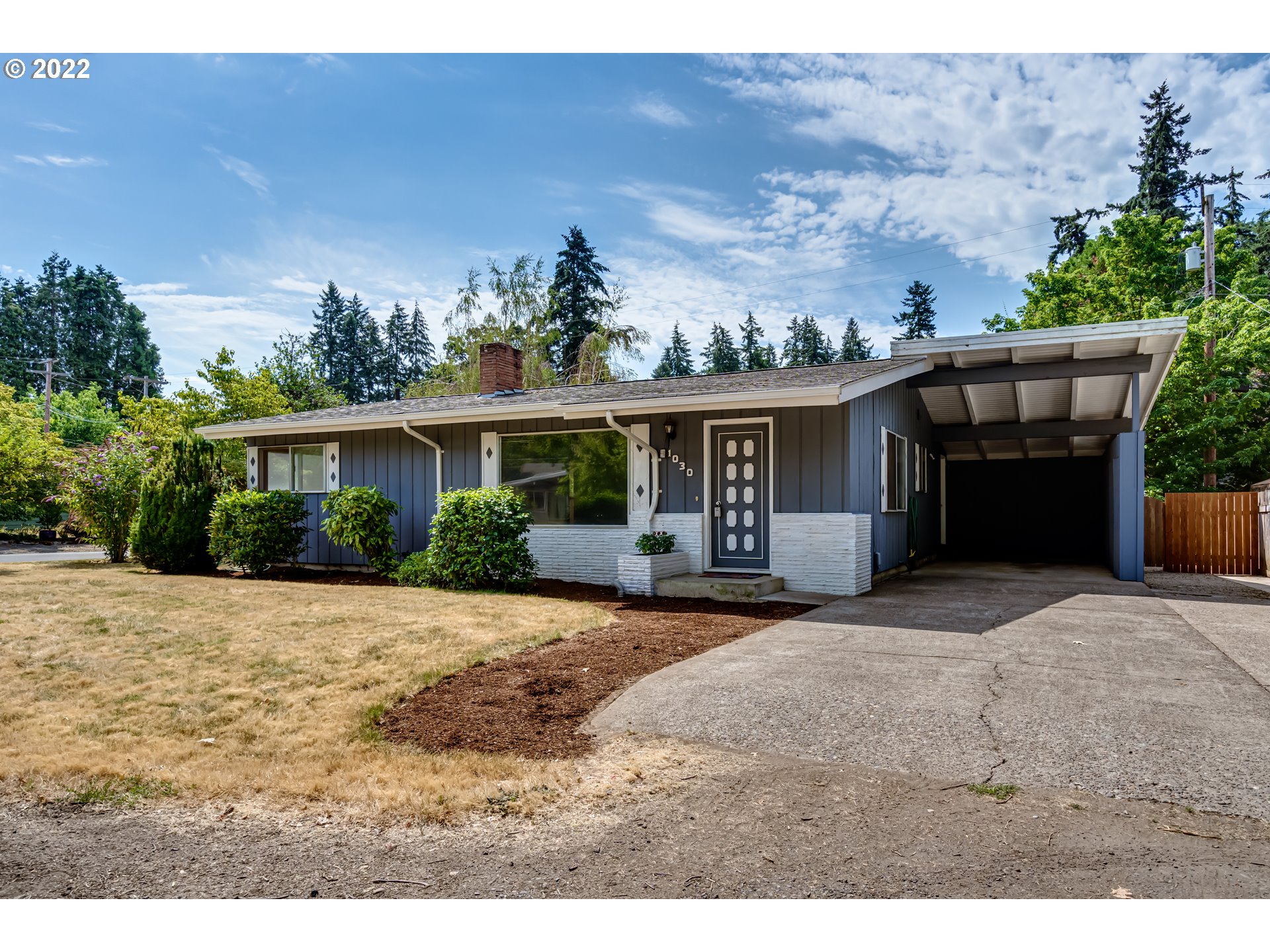 Classic mid-century home on a quiet corner lot. 1st time on the market in 50 years! This pristinely cared for home boast stunning wood ceiling with open beams, beautiful oak hardwood flooring and wood burning fireplace. Large dining room or potentially second living room. The mod design of 1960 has been lovingly preserved with minimal, tasteful updates. Featuring a private fenced yard and covered porch/work shop, you won't want to miss the River Rd gem!