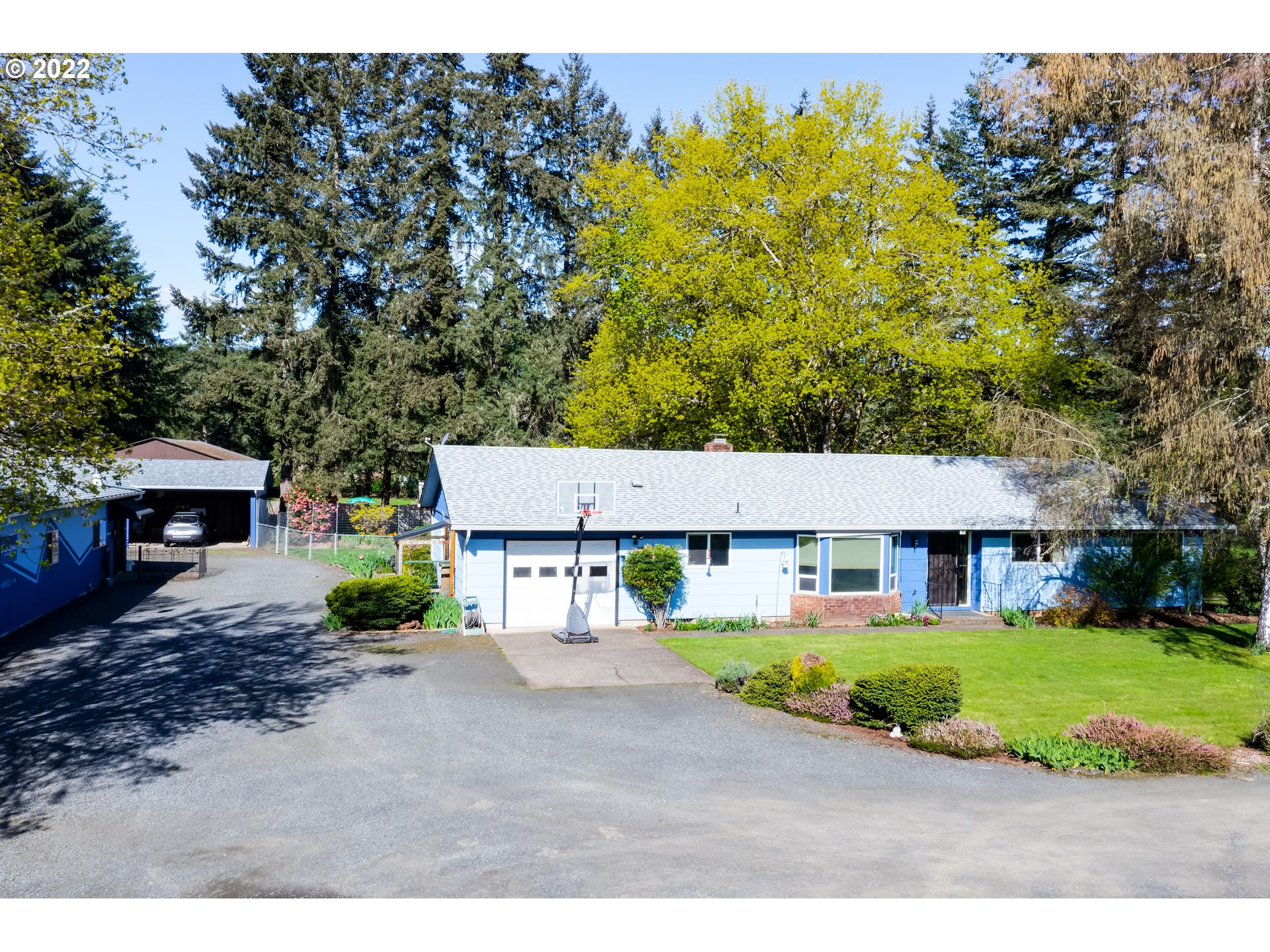 Opportunity for home business, potential extra living space or office and finished 25x28 shop (1300 SQ FT in total). Very well cared for home on an acre of beautiful land. Open concept living, upgraded kitchen, brick hearth ready for wood stove, 4 bed/2 bath in main living and shop area has extra bedroom, 1/2 bath and pellet stove.  Large shop (dog training biz). New roofs and gutters, paint, good well, 3 car carport all on one well appointed  acre.