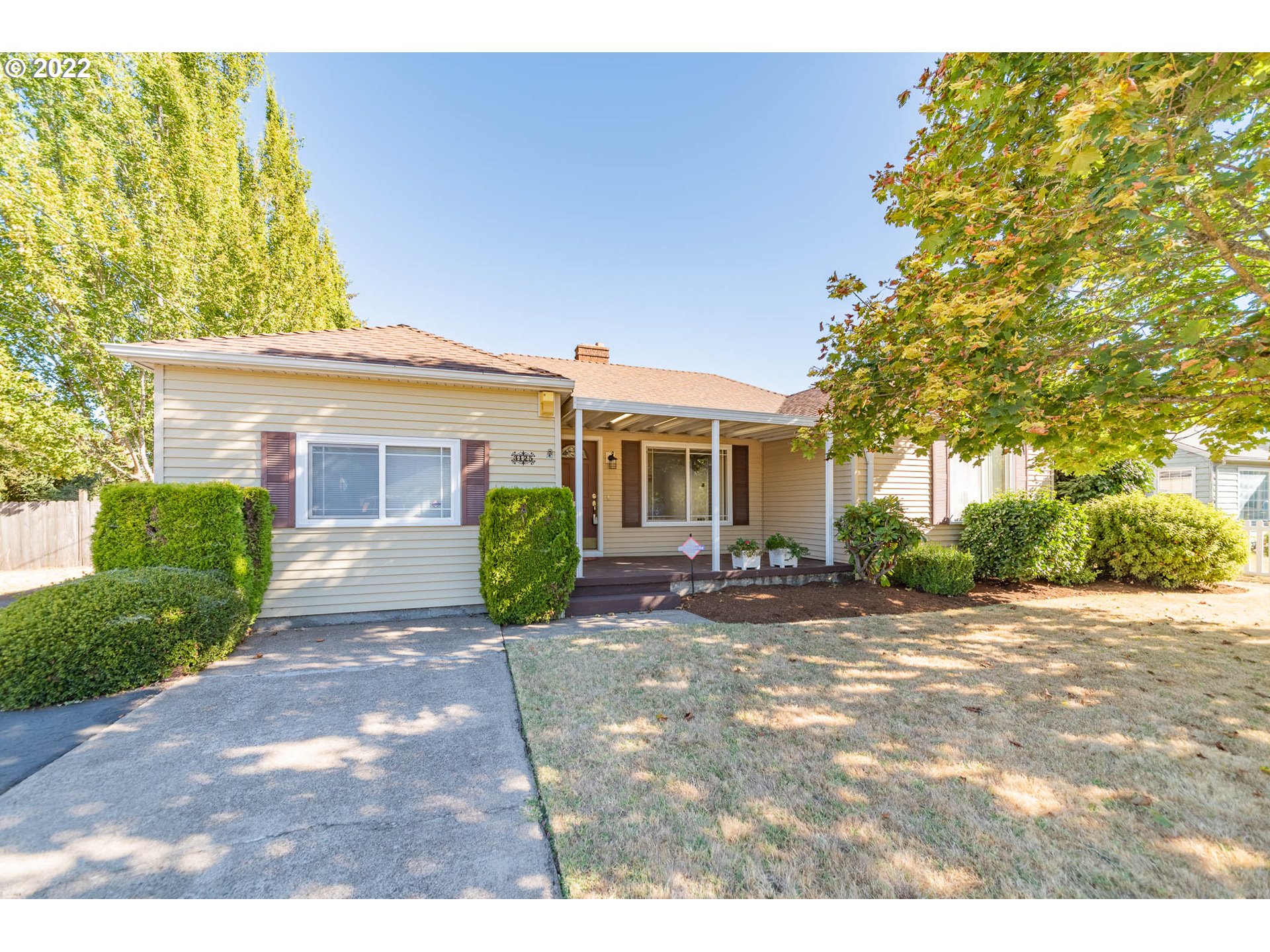 This charming home is ready for some updates and personality! 2 bedroom, 2 full baths with a large bonus room. Hard wood floors under some of the carpet. Huge 30 x 24 shop and a large tool shed. Covered deck off dining area, RV parking and storage, large .25 acre lot ready for a green thumb!! Come see the space and possibilities to make it your own.