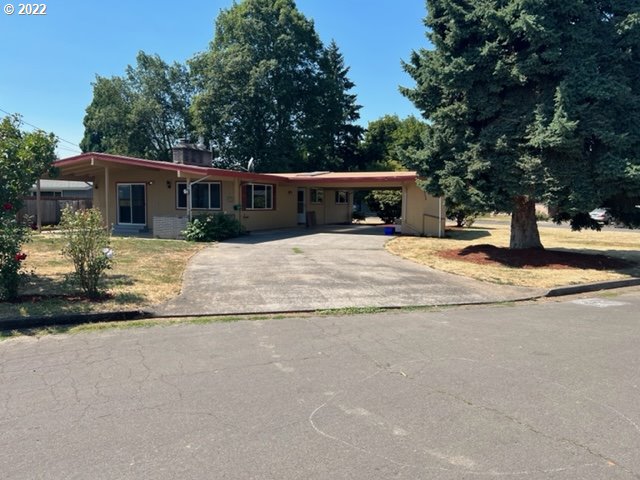 Open Sunday Oct. 1st, from 1-3PM. Exceptional Price & Great Location! Beautifully updated home on a large lot. New luxurious laminate flooring, paint, molding, doors, windows & light fixtures. Open kitchen w/ breakfast bar, stainless steel appliances & pantry. Two Fireplaces- Gas & wood. Professionally tiled & updated bathrooms. Large covered patio & plenty of parking. Nice established neighborhood close to schools, parks, bike paths & river.