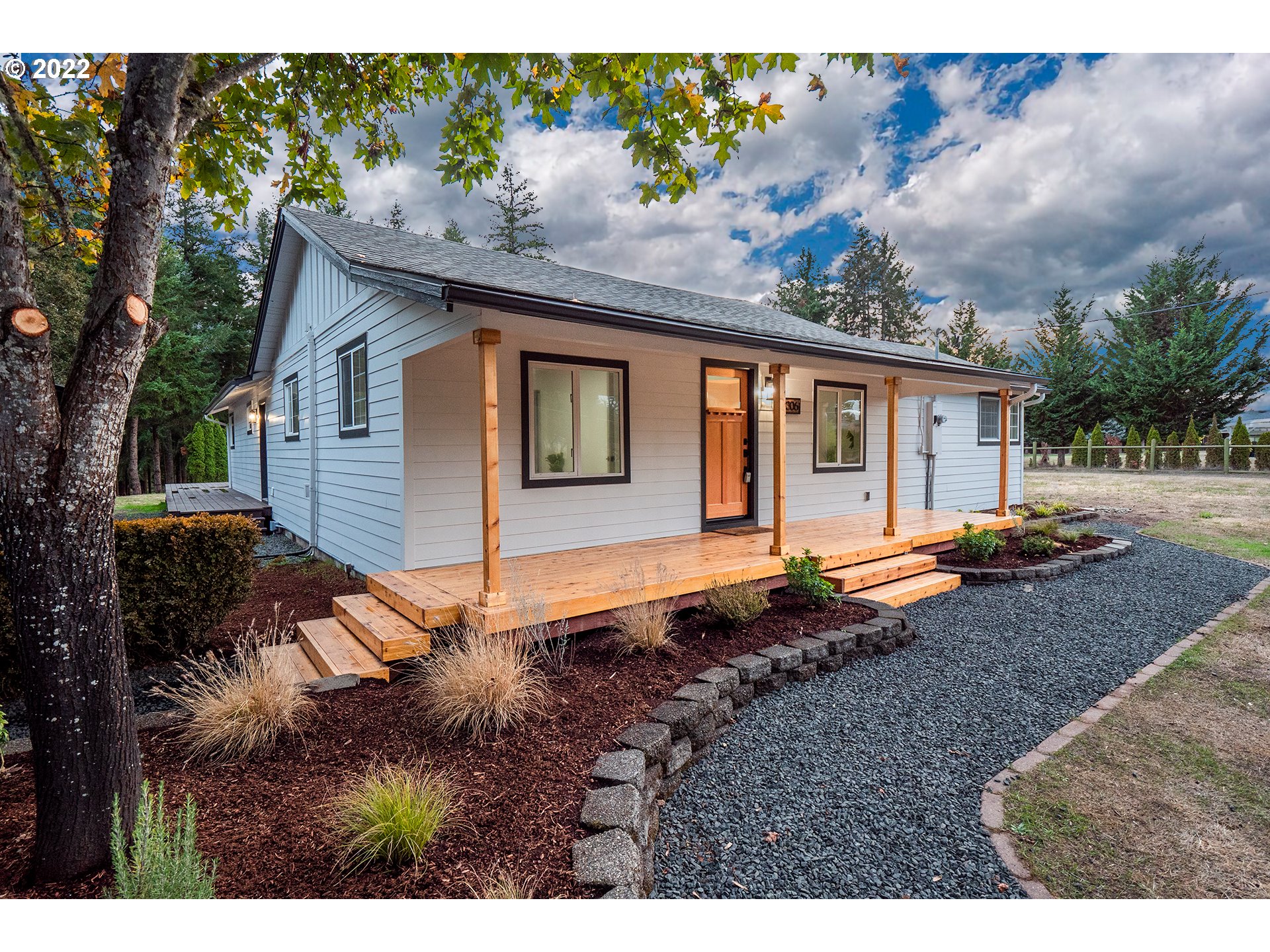 One of a kind! New large 20x25 garage/shop with power on concrete slab. Newer roof, new siding, exterior/interior paint, light fixtures, hardware, outlets/switches, SS appliances, LVP flooring and insulation and vapor barrier in the crawlspace. Updated heat/cool hvac system with updated ducting, a huge back deck and a front covered porch. Public utilities, ~1 acre and walking distance to Veneta City Park and Community Center, this is a must tour!