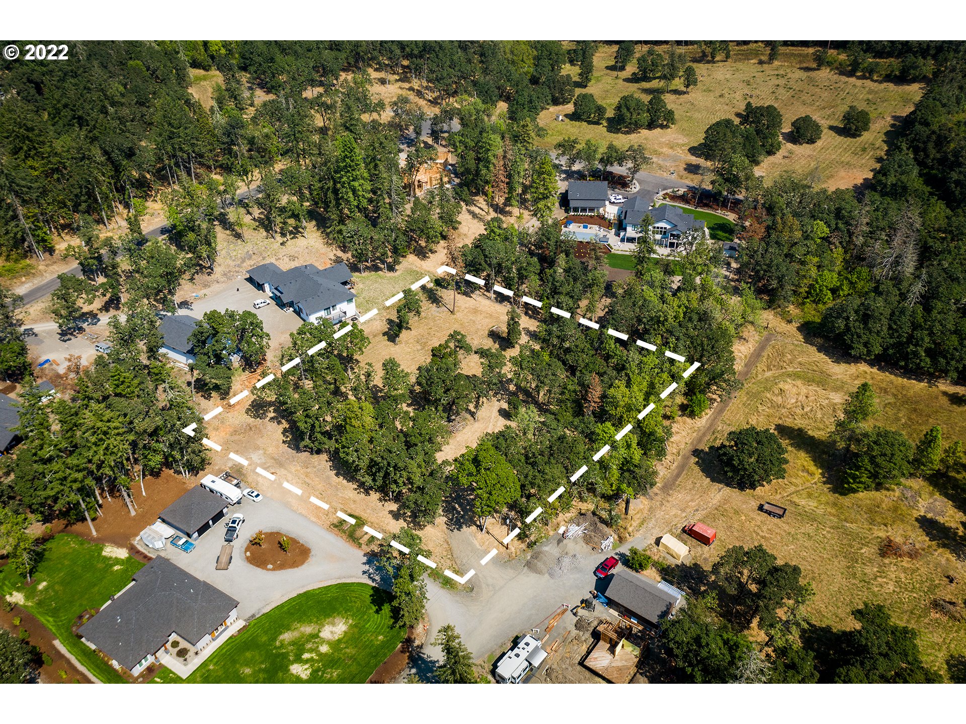 Incredibly rare 1.5 acre lot in the heart of Springfield and recreation! Drilled well, lower county taxes, high-end neighboring homes, an open build site with mature oak trees, this is currently the only lot available. Appointment required. Owner carry available. Supporting info documents available. Surrounded by the valley, river and minutes from Dorris Ranch Park, both Eugene and downtown Springfield, a truly rare opportunity to have a country surrounding and city convenience!