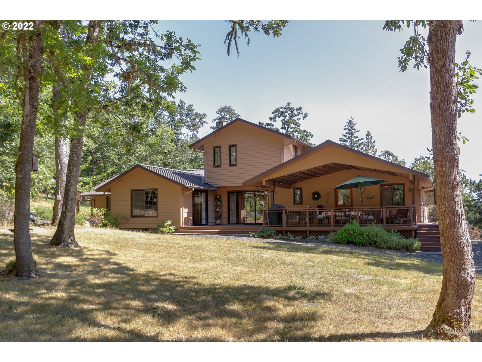 Move-in ready home on 2+ acres in SE Eugene! Enjoy views of your own land, fenced garden spaces, & mountains in the distance. Property features a circle driveway, a large 48 by 27 ft shop that could accommodate a Class A RV, two 1500 gallon well water cisterns, & a large, private covered deck. The home boasts a certified wood stove, two living rooms, a spacious kitchen w/ an eating bar, two car garage, an office & craft room plus 3 bedrooms. Don't miss the unfinished attic/bonus room! $795,000.