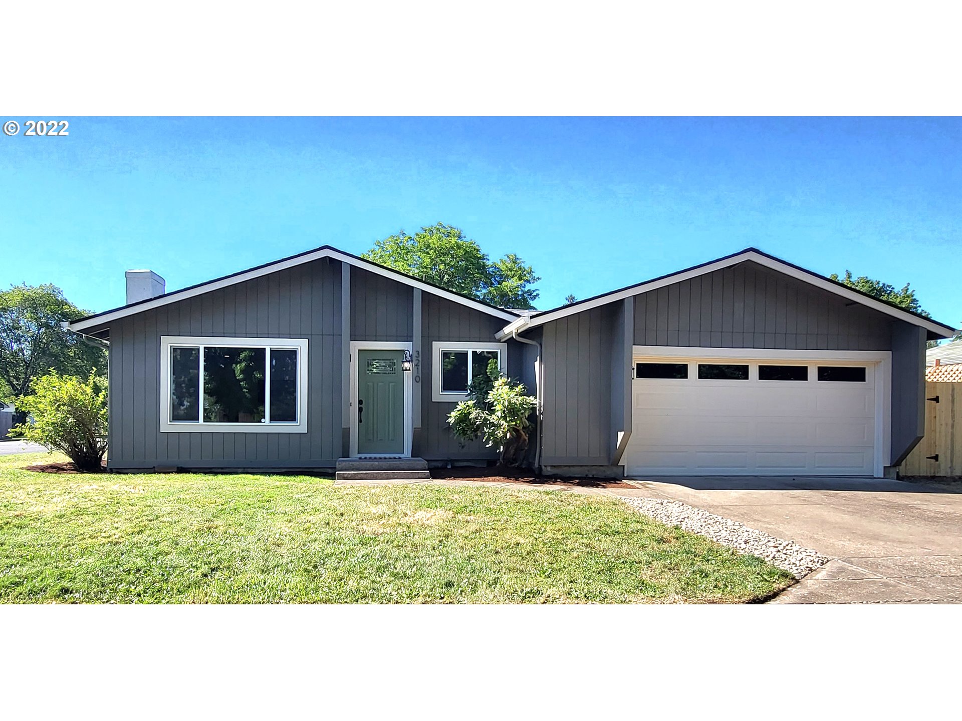 This home shows like new! Located close distance to shopping and Acorn Park. Lots of new upgrades-New int/ext paint. New carpet in bedrooms and new laminate flooring in the rest of home. Vinyl windows. AC/Heat pump! Updated bathroom w/dbl sinks. Kitchen is bright w/new cabinets, granite counters & stainless appliances, opening to dining room w/slider to backyard. Great for entertaining. Nice Layout! Living room features a beautifully tiled fireplace. Yard is fully fenced with covered patio.