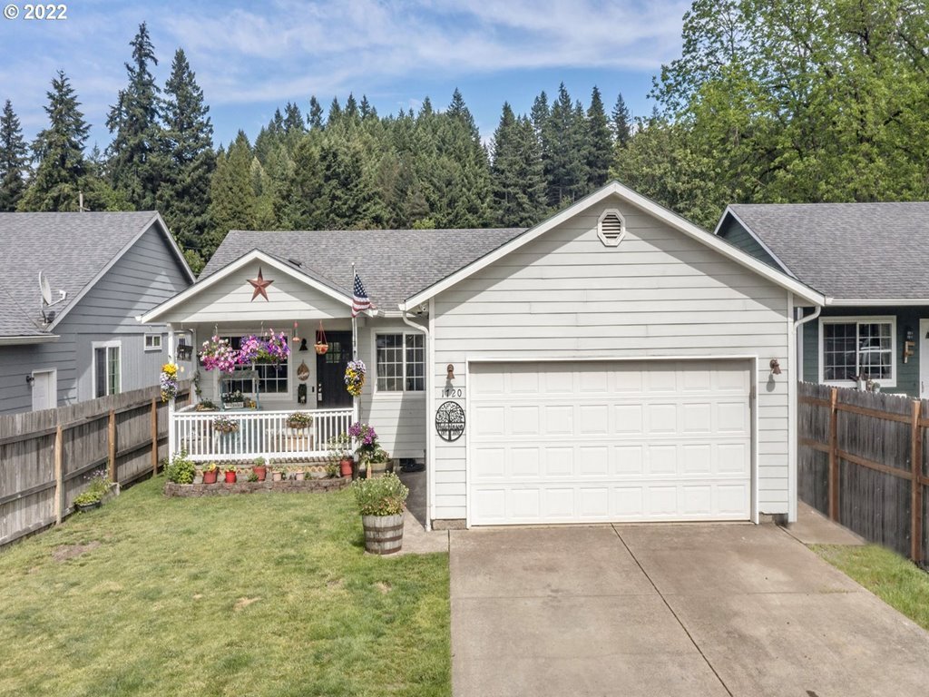 Pride of ownership turnkey home with RV parking in town! New heat pump, new water heater, new floors, new fridge, new convection microwave, new sink and faucet. Come see this wonderful home with well manicured yard, shed storage, Invincible Trex decking covered front and back porches, vaulted ceilings, custom countertops and more! Minutes to downtown, hiking trails, fishing and other amazing outdoor activities!