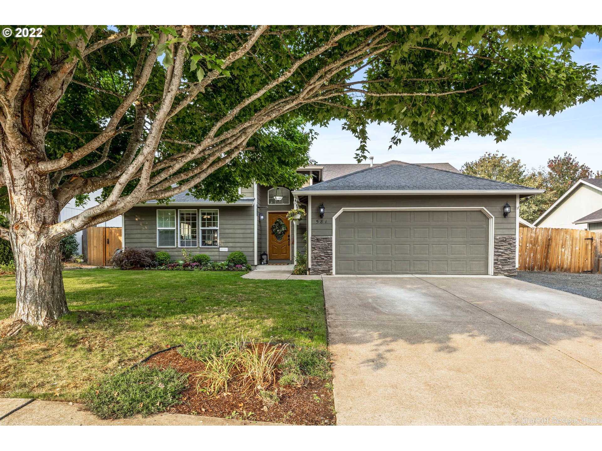 Come and see this beautifully updated home tucked away in the quiet Creswell community. Home features new flooring, paint, baseboards, fixtures and custom shelving throughout in the last 4 years. Open concept living room with vaulted ceilings & skylights. Kitchen and eating nook feature newer appliances, quartz countertops and siligranit sink.  Large backyard with a brand new composite deck surrounding, perfect for entertaining. Raised garden beds, RV/boat parking, large driveway. MUST SEE!