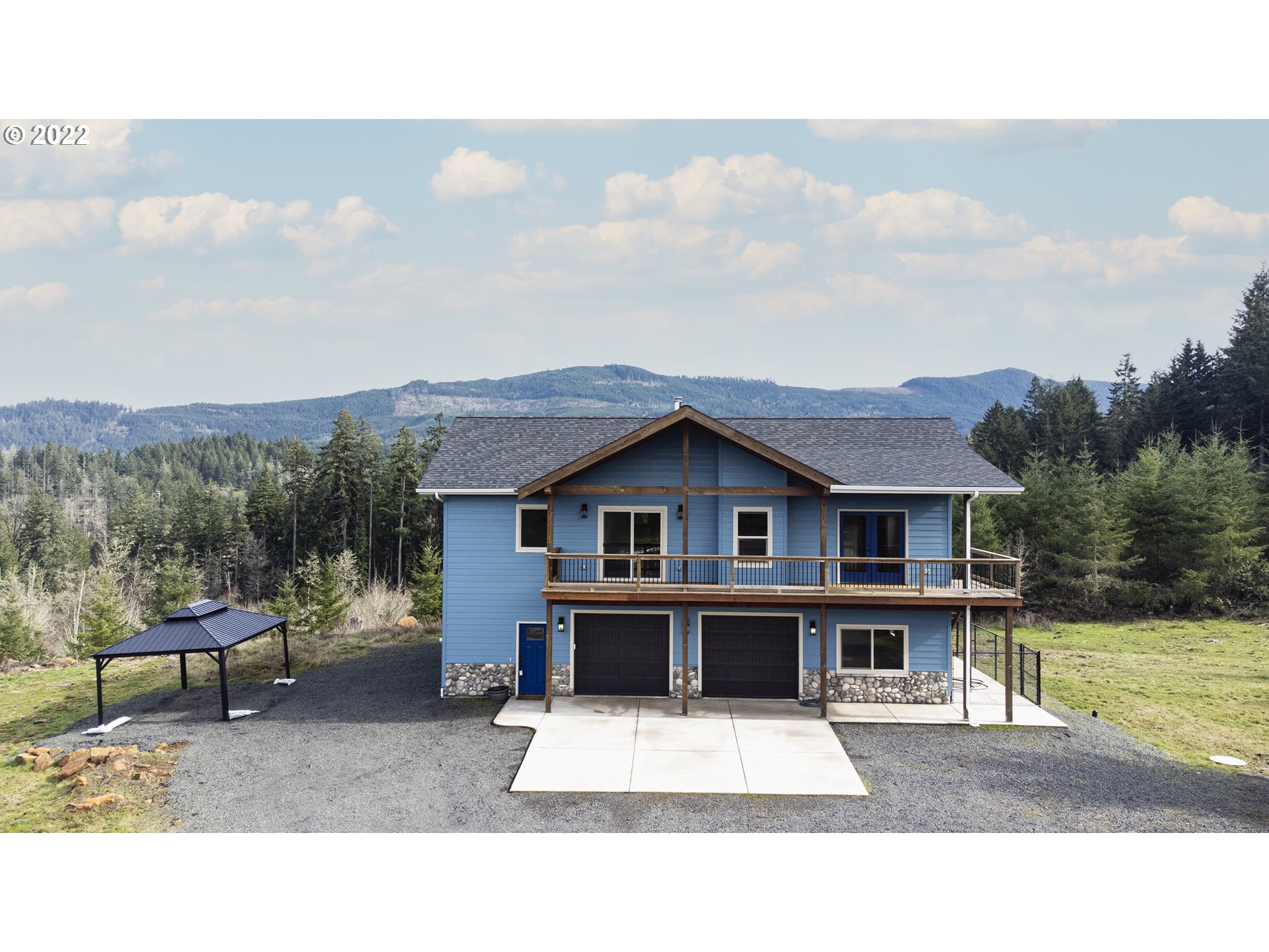 Secluded hilltop retreat with breathtaking views of Spencer's Butte & Mt Pisgah, an easy 15 min from Eugene. Featuring: on demand HW, heated tile floor in the master Bath, 3 skylights & a sun-tunnel for natural light, knotty alder doors/trim, rustic hickory cabinets in the kitchen. Outside is a 120X60 riding arena with 2 stalls & a tack room. Saddle up & ride off into the sunset undisturbed on your very own trails. Entry gate with keypad & remote switch inside. Watch your timber investment grow!