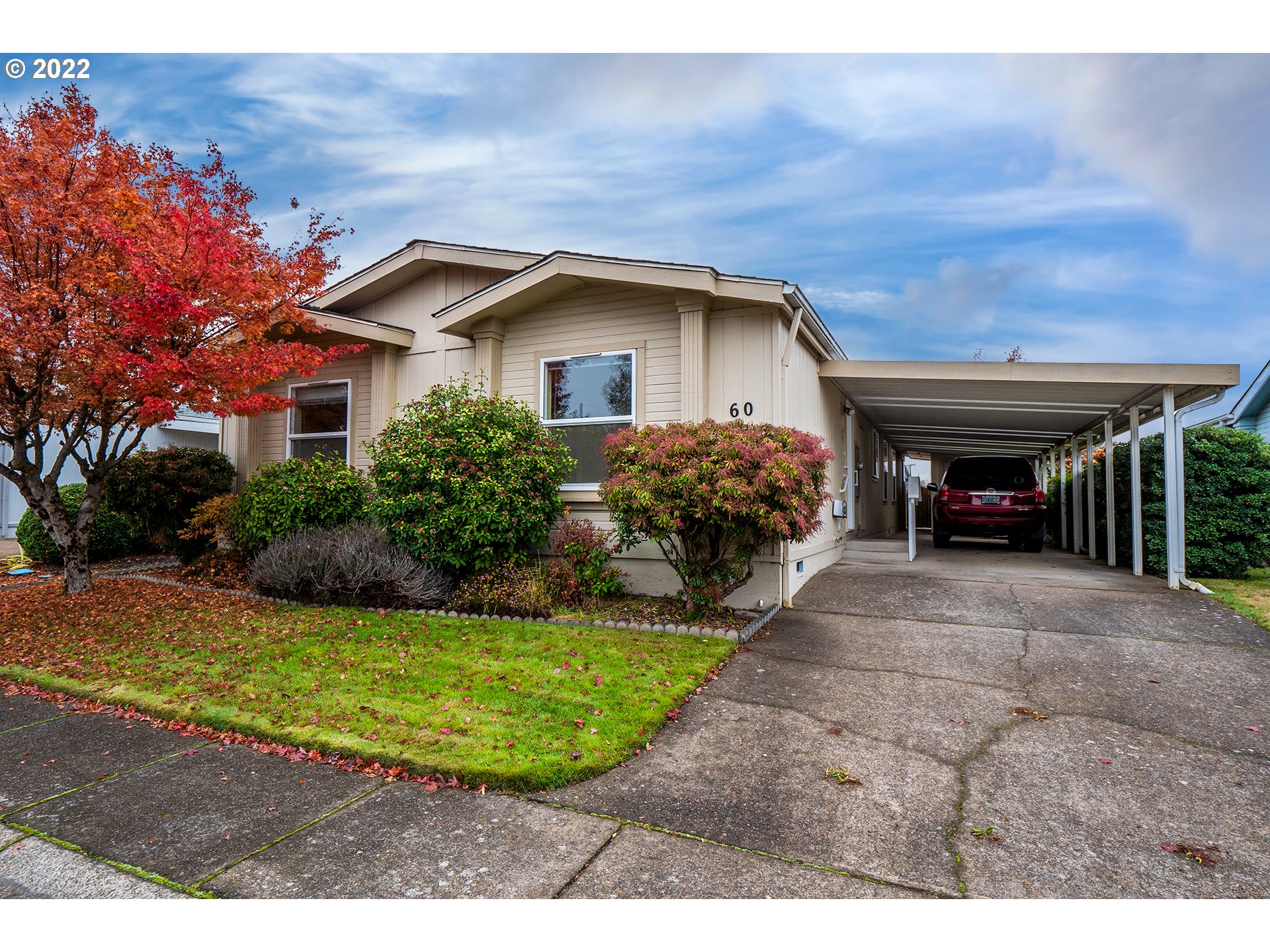 Beautiful home in quiet gated community with private access to Dodson Slough Lake. 3 bedroom 2 bath floorpan with open layout provides a cozy feel with plenty of space. The home has a great covered carport with a generous secured storage area. These units go fast with limited availability in this great location. Contact your agent to schedule a showing today! Dues include pool, water, sewer, trash, cable, gym, park management, and security gate. RV storage is available.