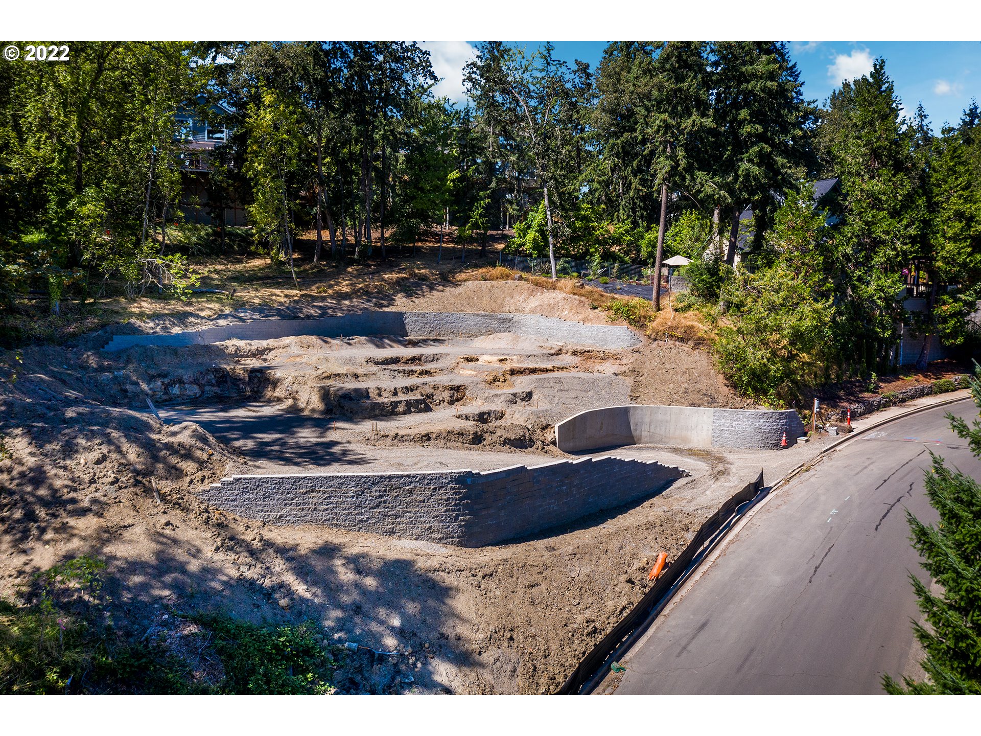 Incredibly rare opportunity to own a build-ready lot with immense improvements located in the beautiful South Eugene Hills! Skip years of infrastructure work and logistics as extensive engineering, retaining walls, and drainage systems are in place. Bring your builder as the original house plans are unavailable. See virtual tour links for further details. Appointment only. South schools, close to shopping and Easterly views, enjoy natural sunlight, beauty, and central convenience!