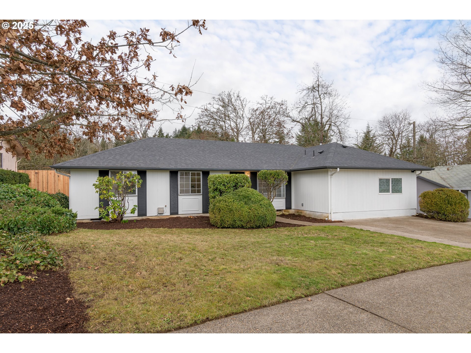 Recently updated 1-level on nearly ¼ acre sunny lot in desirable Friendly Neighborhood! You'll love the floor plan w/ an open feeling but still w/ great separation of space. The kitchen, dining and living rooms are the heart of the home side while 3 bedrooms & 1 updated bath are at one end. A cozy family room w/ fireplace and generously sized primary bedroom ensuite & 2nd bath are at the other end. The primary bed/bath was adapted for easy-of-use w/ wide doors, roll-in shower, open vanity/sink and plenty of room to maneuver. Wheelchair accessibility is a priority with ramps leading to the front entrance and French doors in back. The spacious yard features a covered deck and tool shed. This home has had over $50k in improvements in the last few months - brand new fence, flooring, paint, interior doors, front door, lighting & hardware, cabinet faces replaced, new range hood, new deck cover, new vapor barrier, fresh landscaping & more. All this plus just a few blocks to schools, parks, bike paths, groceries, restaurants & the Friendly Street Market food trucks.