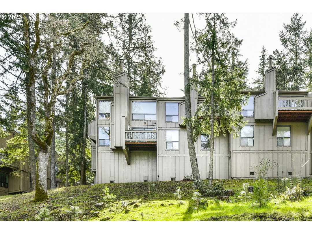 115 Treehill LOOP Eugene, Oregon Picturesque nature views from the balcony (redone in 2019) and large double paned vinyl sliding glass door and windows! Custom window treatments stay. This lovely remodeled condo has a stainless steel basin sink, ample cabinetry and a pantry. Custom woodwork throughout including a wood/glass built-in china cabinet, beautiful wood mantel, built-in lounge seat for nature viewing and custom built-in desk/shelves/storage in the larger bedroom. Ductless HP installed in 2020. Roof in 2022. Access to Ridgeline Trail system from the upper parking lot. Don't miss it!