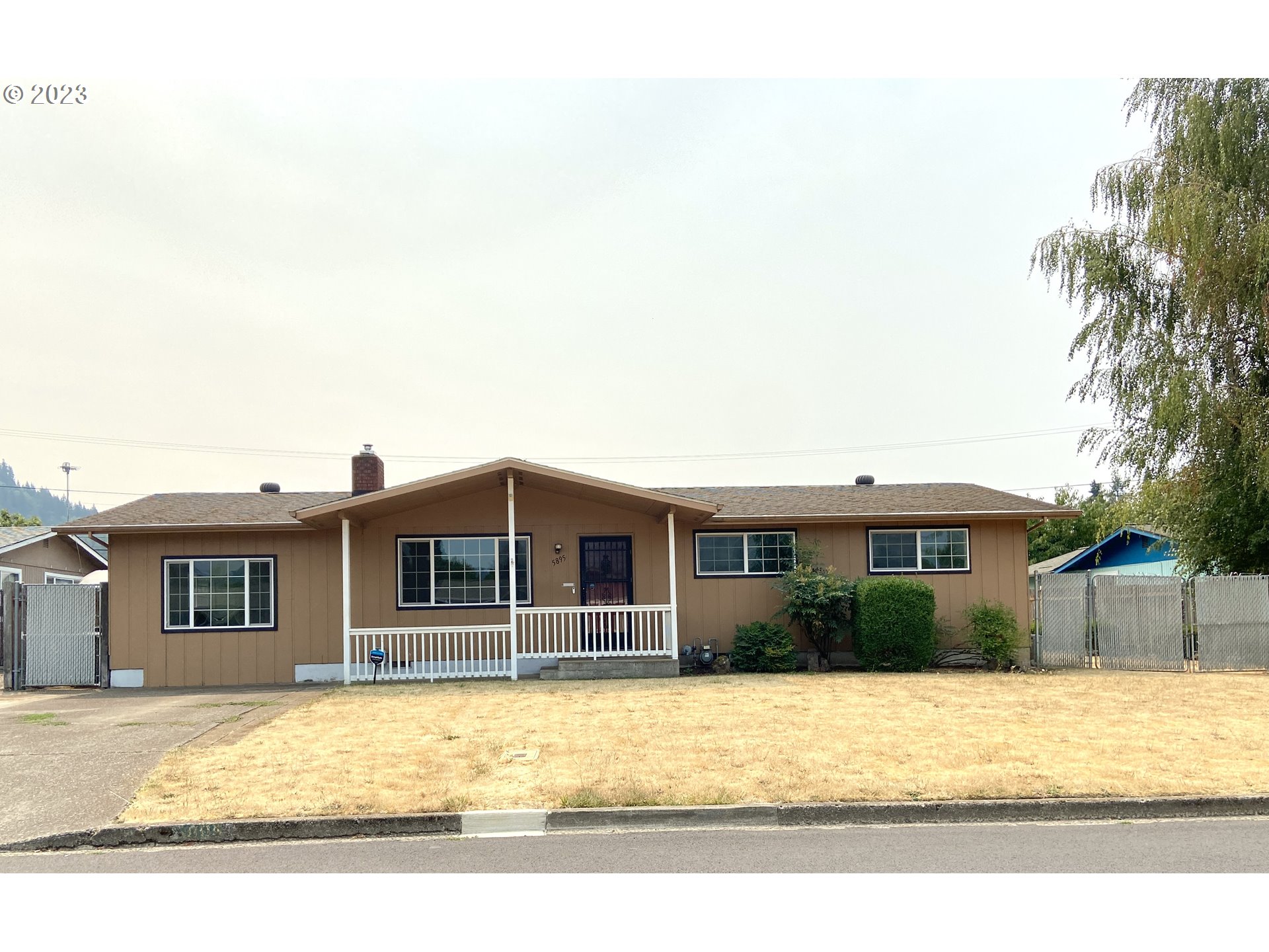 Price Improvement on this very nice home with an oversized, 2 bay detached garage/shop that sits behind home. This is a wonderful large space for all of your hobbies. Large .21 of an acre lot with double gates for RV parking and garage access. Home has 3 bedrooms and 1 recently updated bath. The garage conversion offers additional space as a bonus room/family room or guest room. All original hardwood flooring throughout. Gas heating and central air, gas fireplace insert, updated kitchen cabinets, inside laundry, large covered back deck patio, additional storage lockers and a tool shed. All of this is located in a wonderful neighborhood of Thurston that is convenient to all shopping, amenities and quick freeway access.