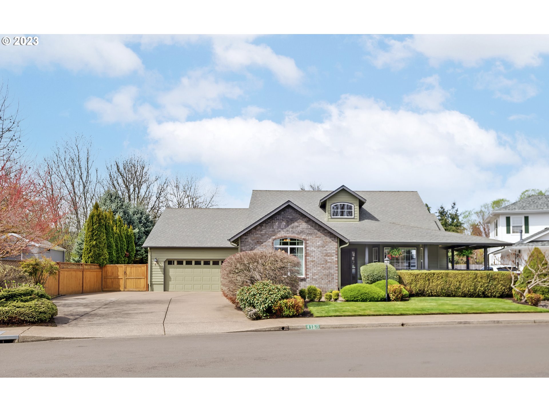 The pictures say it all. This beautiful single level home in the popular Lee Estates  features  is move in ready.  With a formal living room with coffered ceilings, plus an open vaulted great room with a gas fireplace and views of an amazing backyard you will have lots of space.  The primary bedroom is vaulted with an oversize master suite and walk in closet as well as French doors to the back yard.  Generous size bedrooms and updated bathrooms.  Outside you will find a wrap around porch w/swing  as well as a beautifully landscaped yard with sprinklers front and back, new fences, water feature, raised garden beds and Tiki hut wired for a tv and RV parking with hookups. The garage is oversized with a large amount of cabinets for storage and an extra large attic space above the garage.  This will not last long.  Priced to sell quickly.