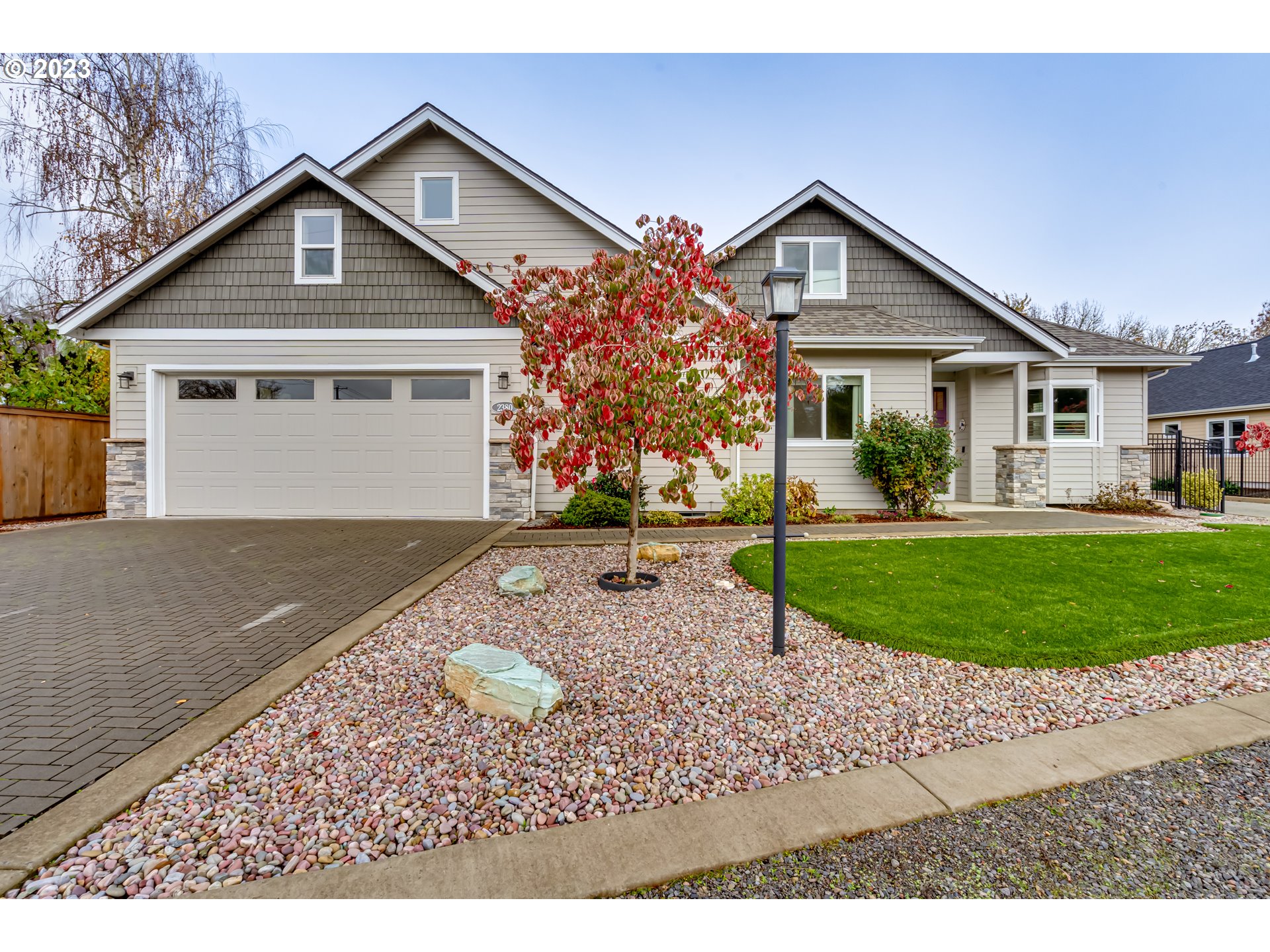 This is your opportunity to live in one of Eugene's most sought after neighborhoods.  Comfortably located in the Ferry street Bridge area, this beautiful Custom Built home by Tom Walter provides quality, comfort and remarkable walk-ability to shopping, schools, parks and entertainment.  You'll be pleased to find that all primary living spaces are located on the main level. Relaxing best describes the Primary Bedroom, with ample space and a gas fireplace you can't help but unwind in this room.  The en-suite welcomes you with heated tile flooring, soaking tub, walk-in shower and double sinks.  There are three other comfortably sized bedrooms and a beautiful second bathroom on this level.  The Kitchen provides an outstanding space for cooking or entertaining and is a baker's delight with all the counter space the large island provides. It's open to the living and Dining rooms so you can enjoy your family and guests. Pull out shelves and a pot filler add ease to your culinary functions. Quartz countertops are used throughout the home to offer beauty and durability and Built-ins provide an abundance of storage.  Bonus and more Bonus is what you'll enjoy on the upper level, with three large spaces to enjoy there are endless possibilities, such as game room, kids playroom, craft room,, family room or an amazing home office.  There is also a half bath on this level.  You will really appreciate the low maintenance yard.  The vibrant green turf provides a lovely look all year long and requires little effort to maintain.  The covered patio and built-in gas hookup allow you to take advantage of your outdoor space year round.  There will be no worries about places to park with an oversized three car garage, large driveway and additional off street parking.  Don't hesitate to come take a look at this Fabulous Custom Home.