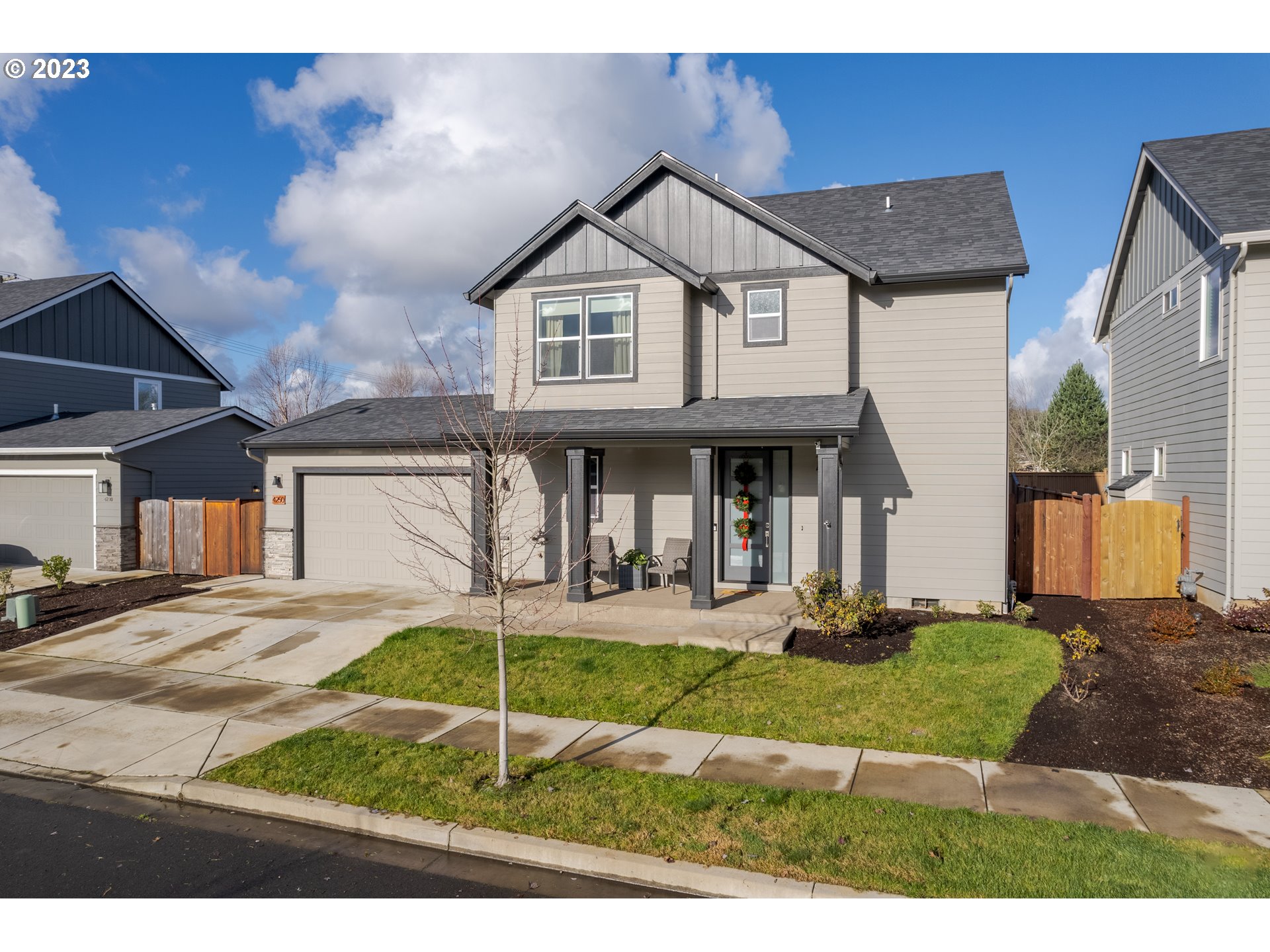 This like-new, quality-built Bruce Wiechert featuring 3 spacious bedrooms and 2.5 bathrooms will be sure to delight even the pickiest of buyers. Built in 2020 with high-end finishes including 9-foot ceilings, luxury vinyl plank flooring, quartz counters & modern shaker cabinets w/ soft close feature throughout, stainless appliances, pantry w/ pullouts, tile backsplash in kitchen, tile floors in the bathrooms, gas furnace, central A/C, Hardie plank lap siding in front & back, and finished garage w/ pull-down ladder for attic storage. This immaculately maintained home has also benefited from many custom upgrades including designer window shades, all new modern lighting, 2 ceiling fans, upgraded bathroom mirrors, brand new washer/dryer, and security features like motion sensor lights, 3 wyze cameras and simplisafe system. Downstairs you will find the open-concept great room featuring a gas fireplace, large picture window, generously sized dining area, gourmet kitchen, utility room and powder room. The light-filled staircase leads to the vaulted primary bedroom ensuite with 11x8 walk-in closet, attached bath w/ walk-in shower and dual sinks plus 2 more bedrooms, hall bathroom w/ soaking tub + plenty of storage. The fully fenced yard is easy to maintain and extremely private with no back neighbors and has underground sprinklers, a covered back patio, covered front porch with stylish glass door, and 4 specialty garden beds made from a porous concrete. Even with all of these amazing features, the owners' favorite part of the home is that it is less than 1 mile to Clearwater Park on the river and the Middle Fork of the Willamette Path trail system....they love riding bikes down thru Dorris Ranch and to downtown Springfield.