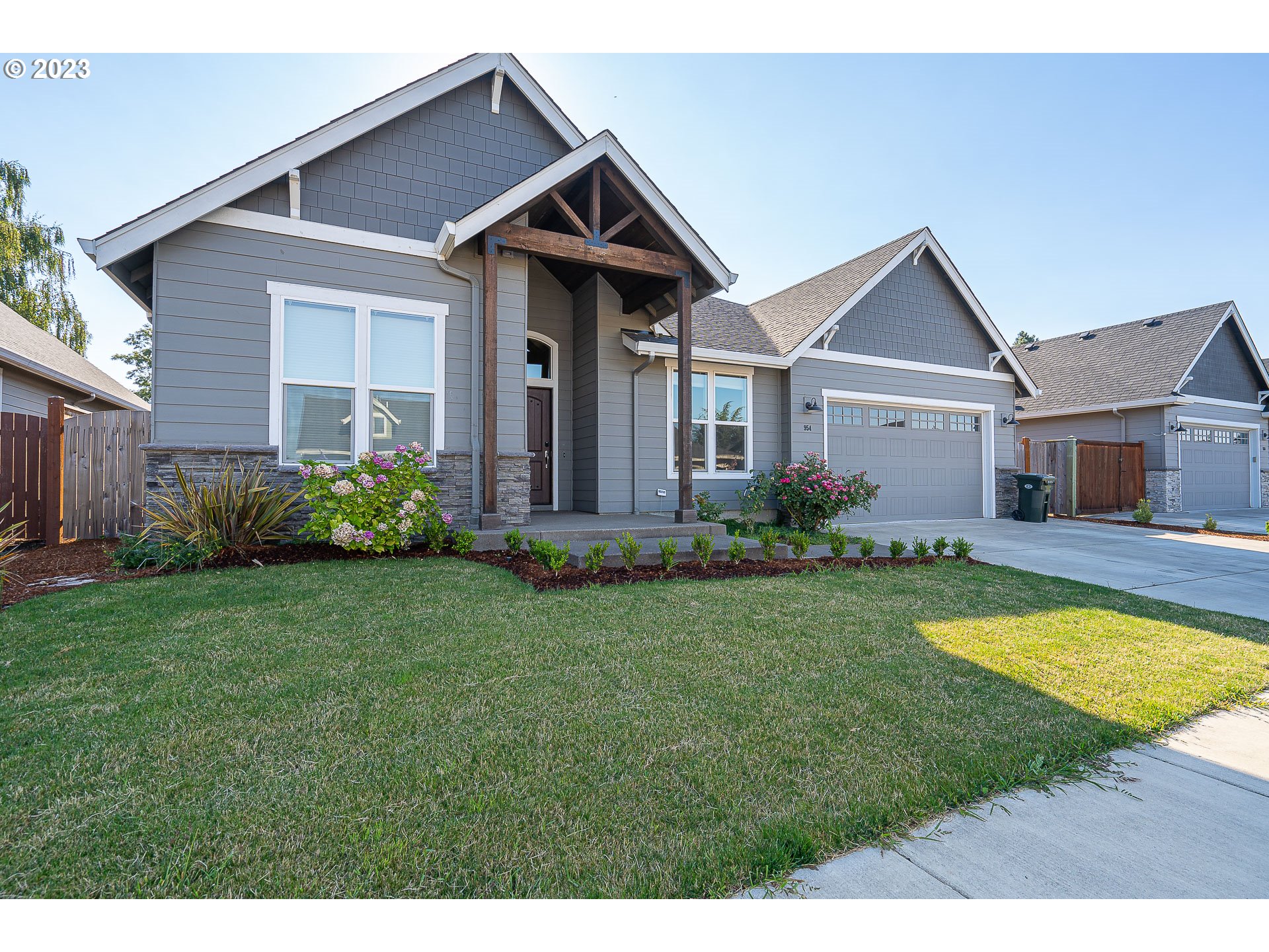 Come view this beautiful Bruce Wiechert custom built home. Enjoy the spacious open concept living area with coffered ceilings that expands into a large kitchen with an eat up bar, quartz counters and a subway tile backsplash. The kitchen also boasts a large walk in pantry and a stainless steel gas stove. The dining room has built ins for your additional storage needs as well as display options. The primary bedroom continues with high ceilings with crown molding, an ensuite bathroom with tile walk in shower and large walk in closet. The third bedroom/office has an additional closet and french doors. Relax in the Private backyard w/vaulted covered patio and gas hookup for BBQ or firepit. In ground sprinklers in front and back. The garage includes a utility sink.