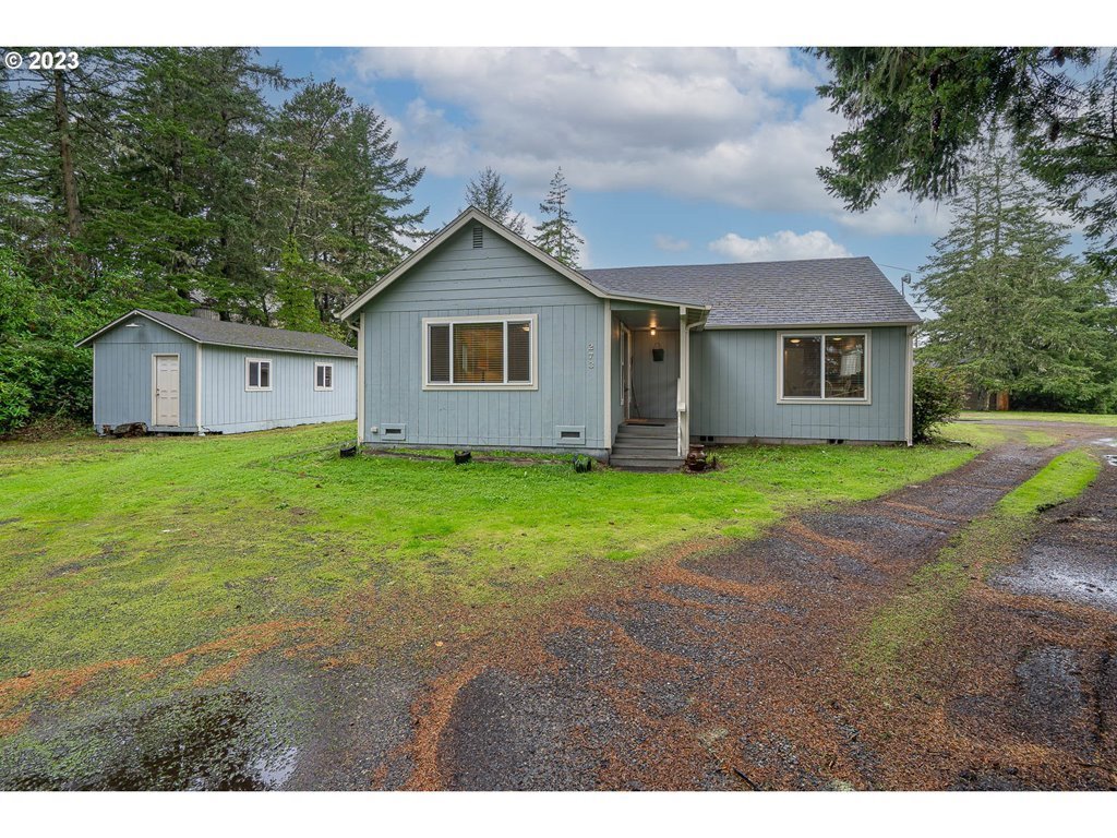 273 KINGWOOD ST Florence, Oregon Unique Opportunity: Impeccable Residence on Three Buildable Lots, a Stone's Throw Away from Historic Florence and a Short Drive to the Majestic Oregon Dunes and hospital. This meticulously cared-for two-bedroom, two-bathroom abode boasts a newer roof, upgraded windows, modernized bathrooms, and an impressive 12 x 20 workshop, complemented by an attached one-car garage. Explore the potential of this remarkable property, where charm, convenience, and coastal living comes together.