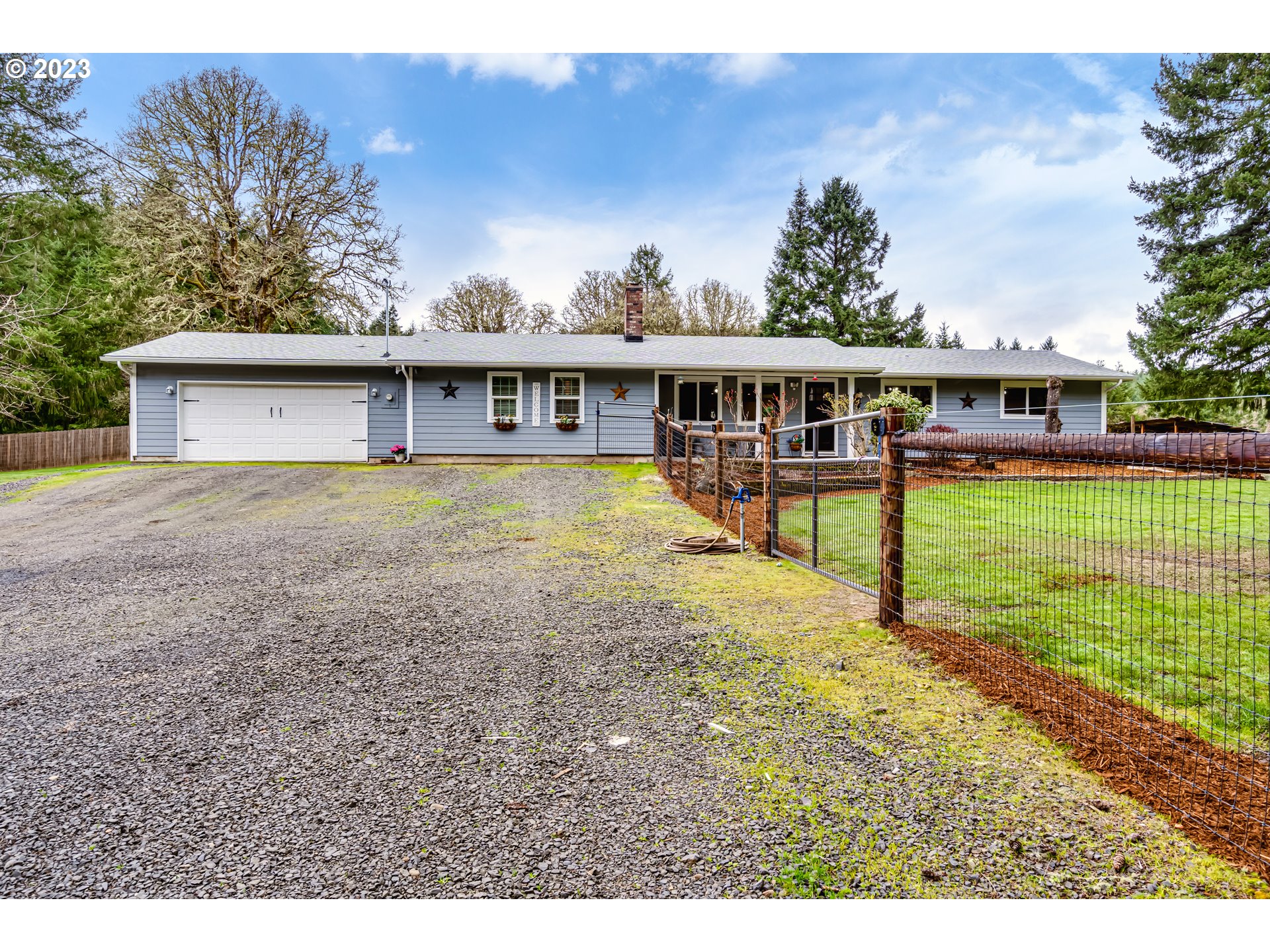 Serene country living at it's best! Charming property in the quaint town of Alpine sits on 1.29 Acre. Home features updated open concept layout with a cozy fireplace. Kitchen offers SS appliances, granite counter tops, Island and a garden window. Hardwood floors through out kitchen, living and dining and hallways. Great separation of space with owner's suite with double closets and a full bathroom. Mud room with Laundry hookups and a sink/ Covered patio / Green house/ Chicken coop/ Huge 2 bay 52X32 shop with a loft and 2X220 outlets/ RV carport / additional Carport for toys/ GEOTHERMAL w/ forced air heat pump/ 2 new water heaters/ 2021 year Hardiplank siding / 2021 Roof/ 2022 windows and so much more! Schedule a showing today. It Won't last!!!