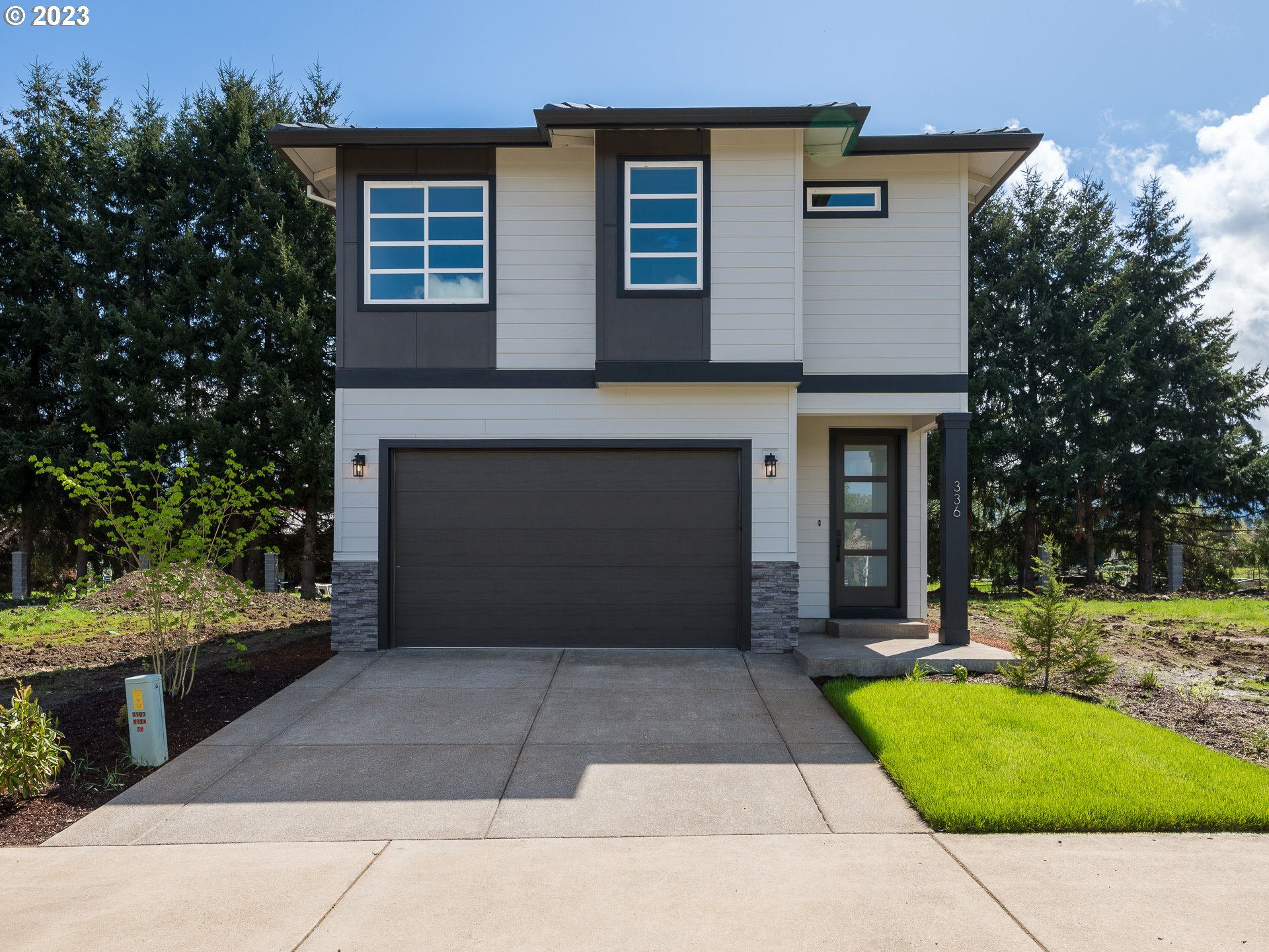 Open Houses:  Thursday May 25th 4-6pm, Sat May 27th 2-4, Sun May 28th 11-1.  Introducing our brand-new contemporary construction, conveniently located just 10 minutes away from Eugene!  Enjoy the best of both worlds with easy access to city while still being able to enjoy the peace and tranquility of a suburban lifestyle. Our community offers a range of 3- and 4-bedroom units, perfect for families of all sizes.  Spacious Great room floorplan on main floor.  The living room has tons of light with large Milgard windows, high ceilings, hardwood floors, and a cozy fireplace. The great room space is open to both the kitchen & dining room.  You'll also find a powder room and generous 2 car garage off the main floor.  The Gourmet kitchen has all stainless appliances, tons of built in cabinets, quartz countertops & tile backsplash.  The generous dining room opens to the back patio & yard for entertainment.  Upstairs you'll find a roomy primary bdrm ensuite with a generous walk-in closet & tons of light. Designer colors & finishes throughout the entire home.  The front yard is landscaped with lawn, hardscape, and sprinklers.  Amenities include tennis courts, basketball, parks, extensive neighborhood walking paths & a renowned golf course which is a short walk away. Call or visit Weekend Open Houses. Builder offering a $10,000 interest rate buy down or closing credit for any home that closes prior to July 15th, 2023.