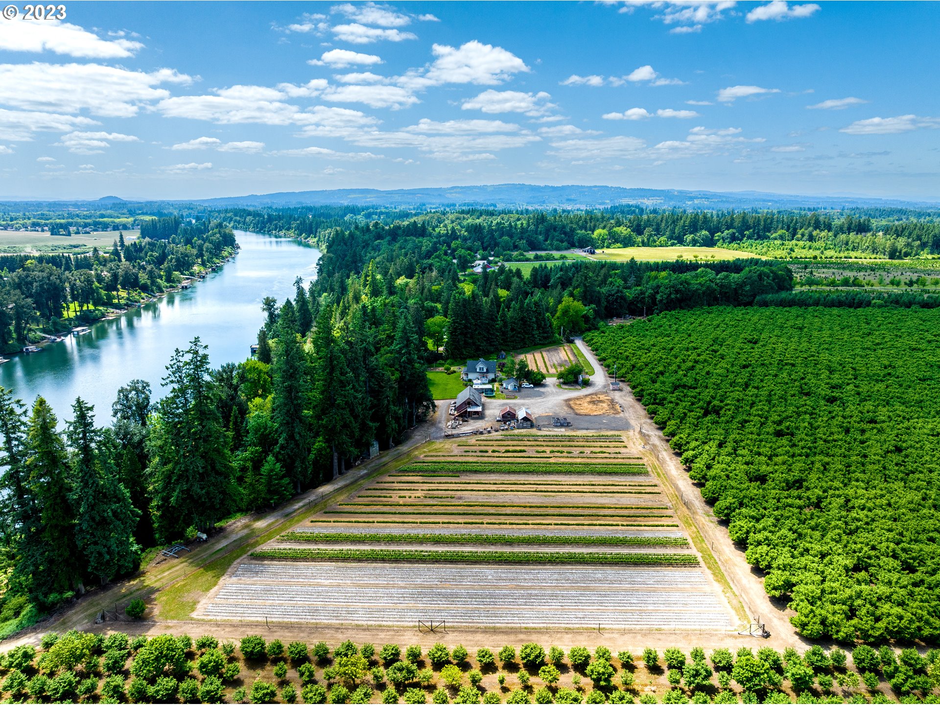 Don't miss this opportunity to acquire this 80-acre riverfront paradise with panoramic sunrise/sunset views and endless possibilities! This extraordinary private farm offers stunning views of the Willamette River, Molalla River, and Cascade Mountains. Including nearly 44 acres of productive tillable/irrigated ground, this farm can grow almost any crop imaginable. There are 2 river access points to a lower bench on the west side of the property and another track to the summer beaches on the east end.