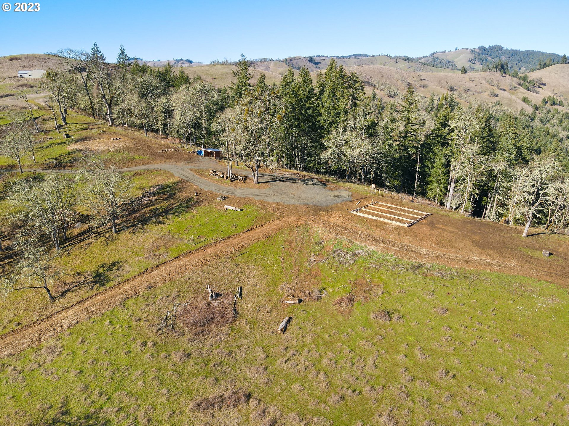 BIRDS EYE VIEWS!! Located on top of the hill is this Gorgeous property with views of the N. Umpqua river, surrounding forests and rolling vista hills. The long PRIVATE drive provides tranquility and privacy. Property is cleared for a home building site, well pumps 15 gallons, septic approval, power close to property edge! This property is fenced, room to garden, and have small animals. Enjoy Country living, mins from town!! NO DRIVE BYS. All showing must be accompanied by an agent.