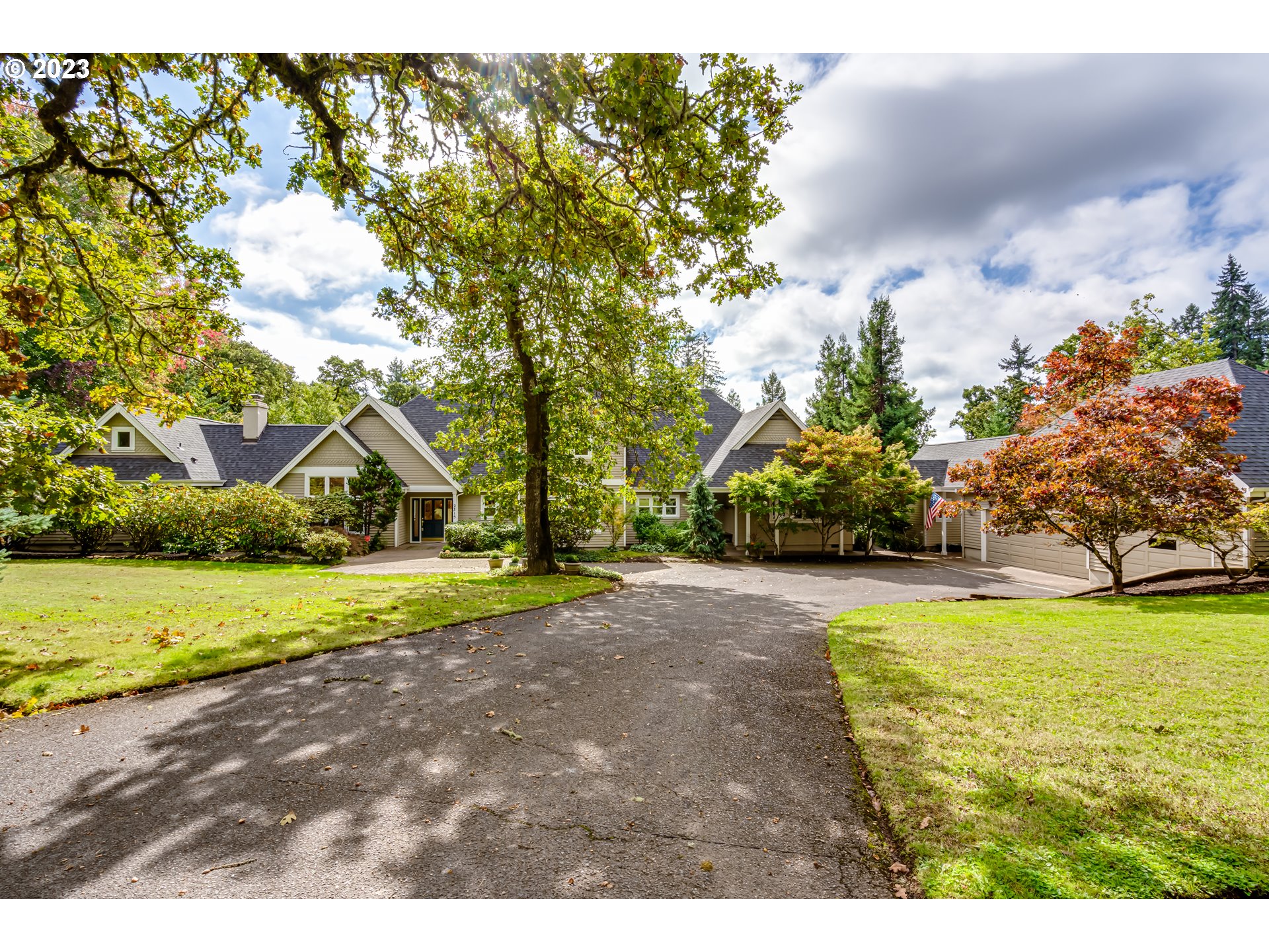 To describe this home without superlatives is a tall order. It is not a stretch to say that it is a one-of-a-kind. Storms Court is a private community of 5 stately homes (7 lots) on a cul-de-sac, thoughtfully developed in the early 1990s. It is located on the shoulder of a knoll, offering remarkably flat land given it?s in the southwest hills. This home is on a double lot and was reimagined by architect Rob Thallon in 2003. Special care was taken to connect the house to the outside and to invite the residents and guests to enjoy the beauty that surrounds them. The deck is south-facing and looks out on an expansive yard. To ensure year-round enjoyment, a portion was covered with a gable roof. This makes a fabulous outdoor dining and recreating area and features an outdoor fireplace. The peace and privacy in a centrally located home is a rare combination. The house was designed to accommodate multigenerational living and includes a lovely accessory dwelling unit, replete with its own bedroom, bathroom and sitting room. The main home manages to be cozy and expansive at the same time thanks to thoughtful layout and the inclusion of features like the inglenook. Custom cabinetry and built-in furniture exude style and class. The owner?s suite opens out to a private patio with a built-in hot tub. The kitchen is laid out for those who love to cook and to host, with ample storage and counter space. The cooking island has a gas, downdraft cooktop. The Sub-Zero fridge is less than a year old. The roof was replaced within the last 3 years and the exterior paint was redone in the last 5. The home has been meticulously cared for and loved and awaits its third owner with open arms.