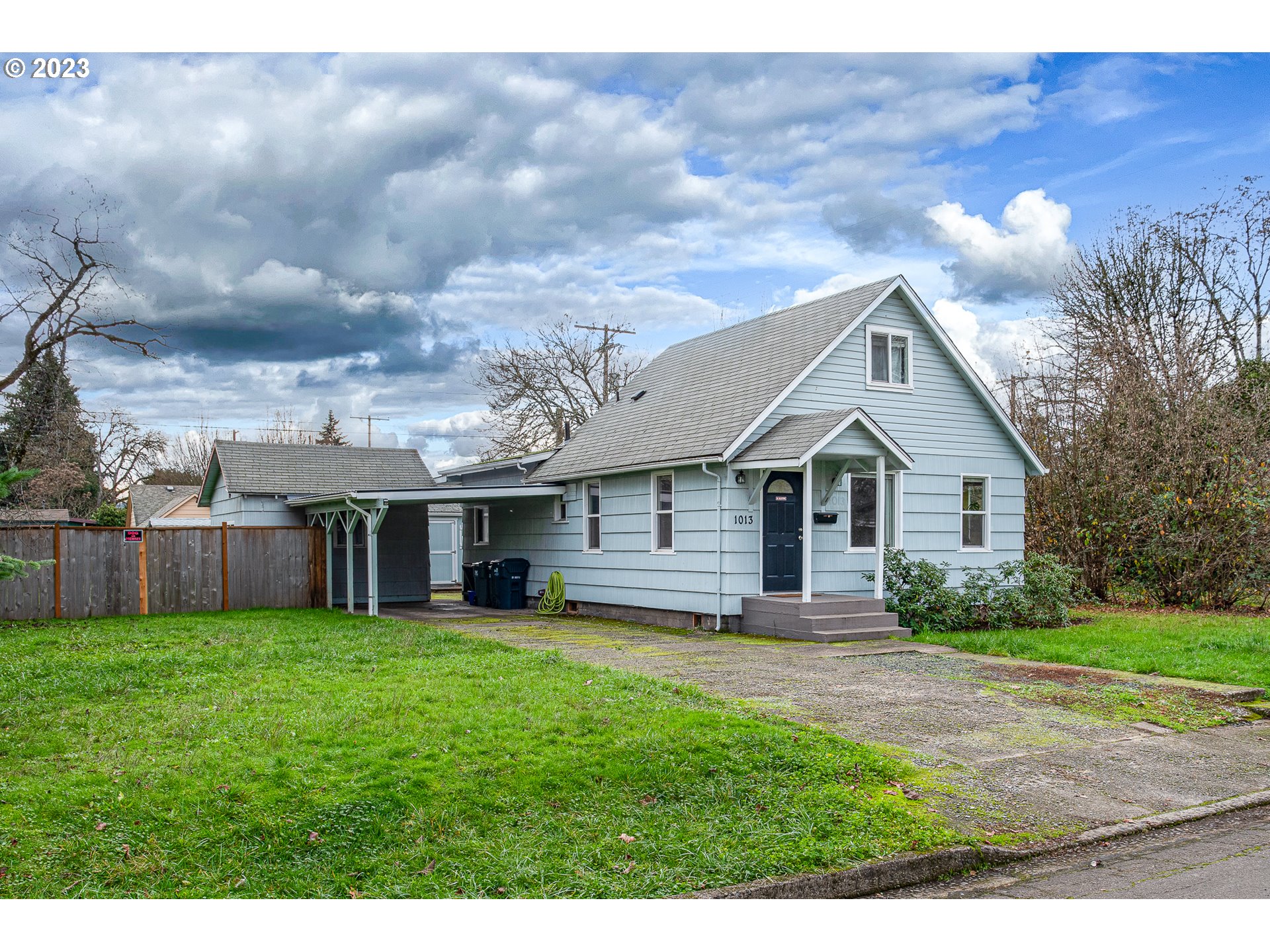 Charming vintage artist's home on quarter acre lot feels like quiet country living while conveniently located. Dead end alley provides additional privacy. Nicely updated while retaining original elements such as built-ins, arched doorways, and wood floors. Large kitchen with eating area plus a separate dining room for flex space. Patio off the kitchen for entertaining. Plenty of gardening space and mature bushes and plants, some from the 40's. Enjoy roses, rhododendrons, plums, honeysuckle, lilac, tulips, hyacinth, iris, and more. Roomy backyard has two shop/studio spaces (12X16 and 15X18) perfect for woodworking, art and crafting studio, home business, in addition to a storage shed. All appliances including washer and dryer convey. Come see if this is your next home!