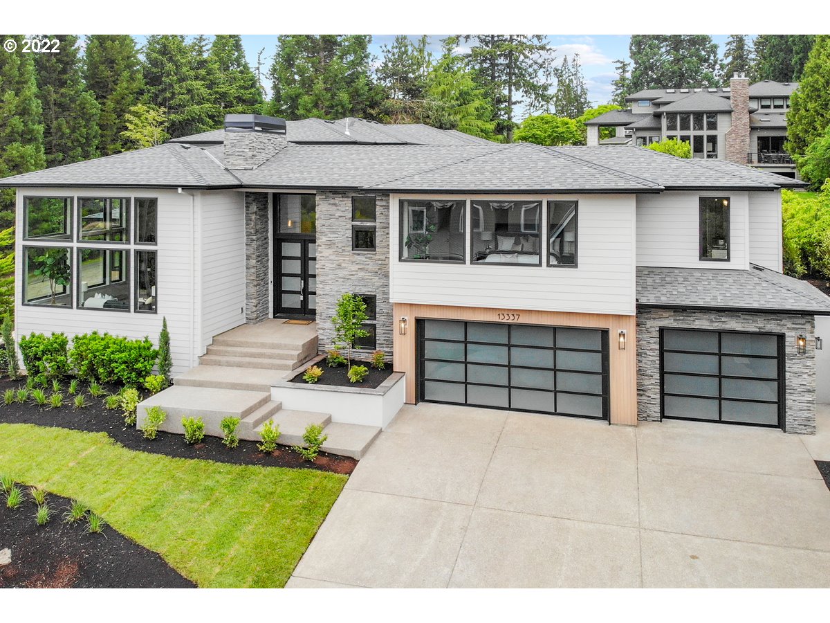 SPECIAL LOW 5% SELLER FINANCING on this flawless new Pacific NW Contemporary! Spacious level pool-sized backyard w/gorgeous covered outdoor living featuring fire pit & built-in grill. Pristine finishes, vast windows, Mt Hood views & all in coveted Forest Highlands! Enter to a statement great rm w/2 story ceilings & hearth & plank hardwood floors. Private primary wing + main floor bdrm & bath. High style, flex space for wine cellar or yoga rm & top LO amenities/schools. Idyllic luxury living!