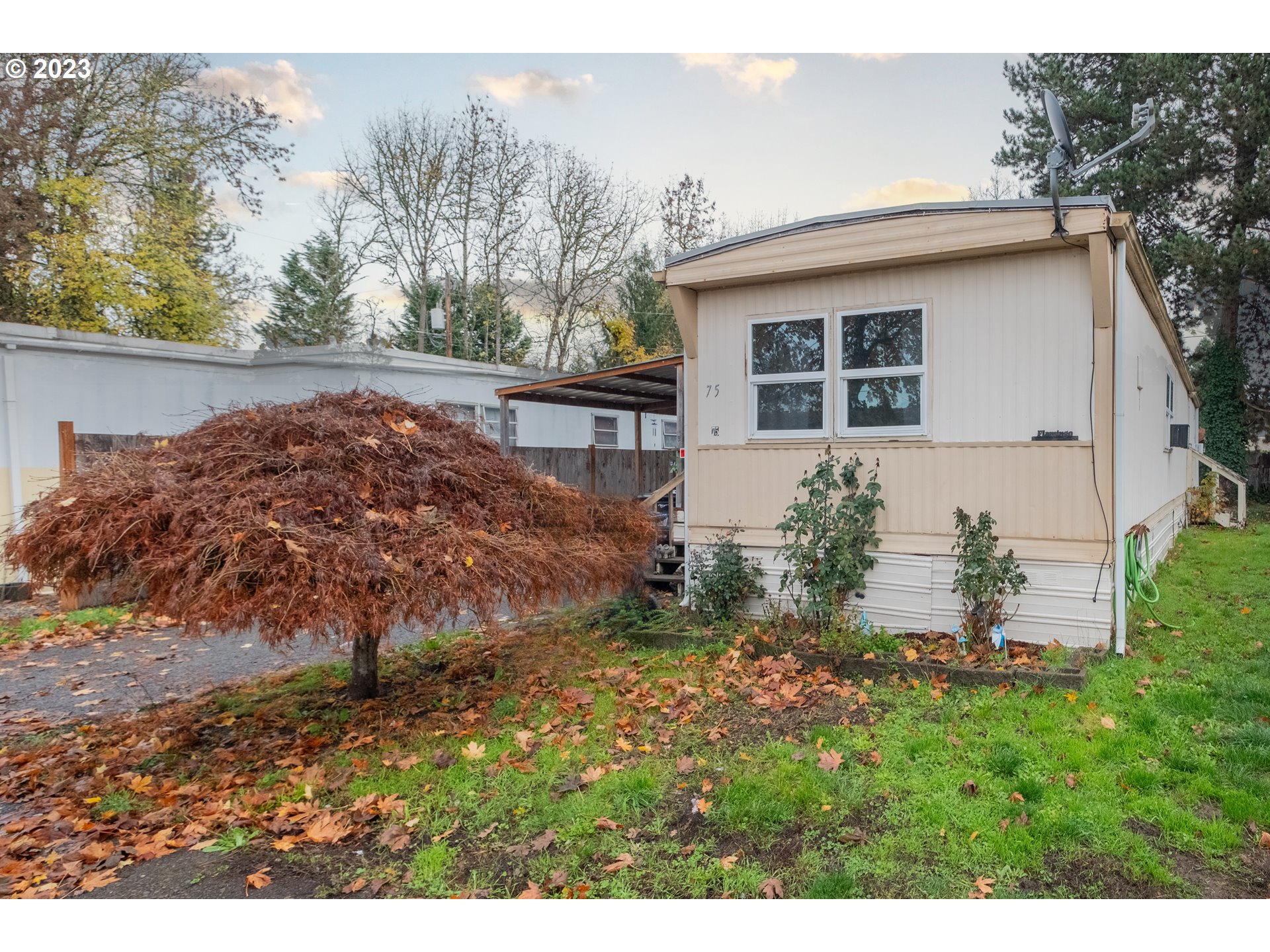 Check out this well maintained 2 bed, 1 bath home in a all age park.  Close to shopping, dining & schools.  Space rent includes water & sewer.  Don't wait.  Come make this your home.