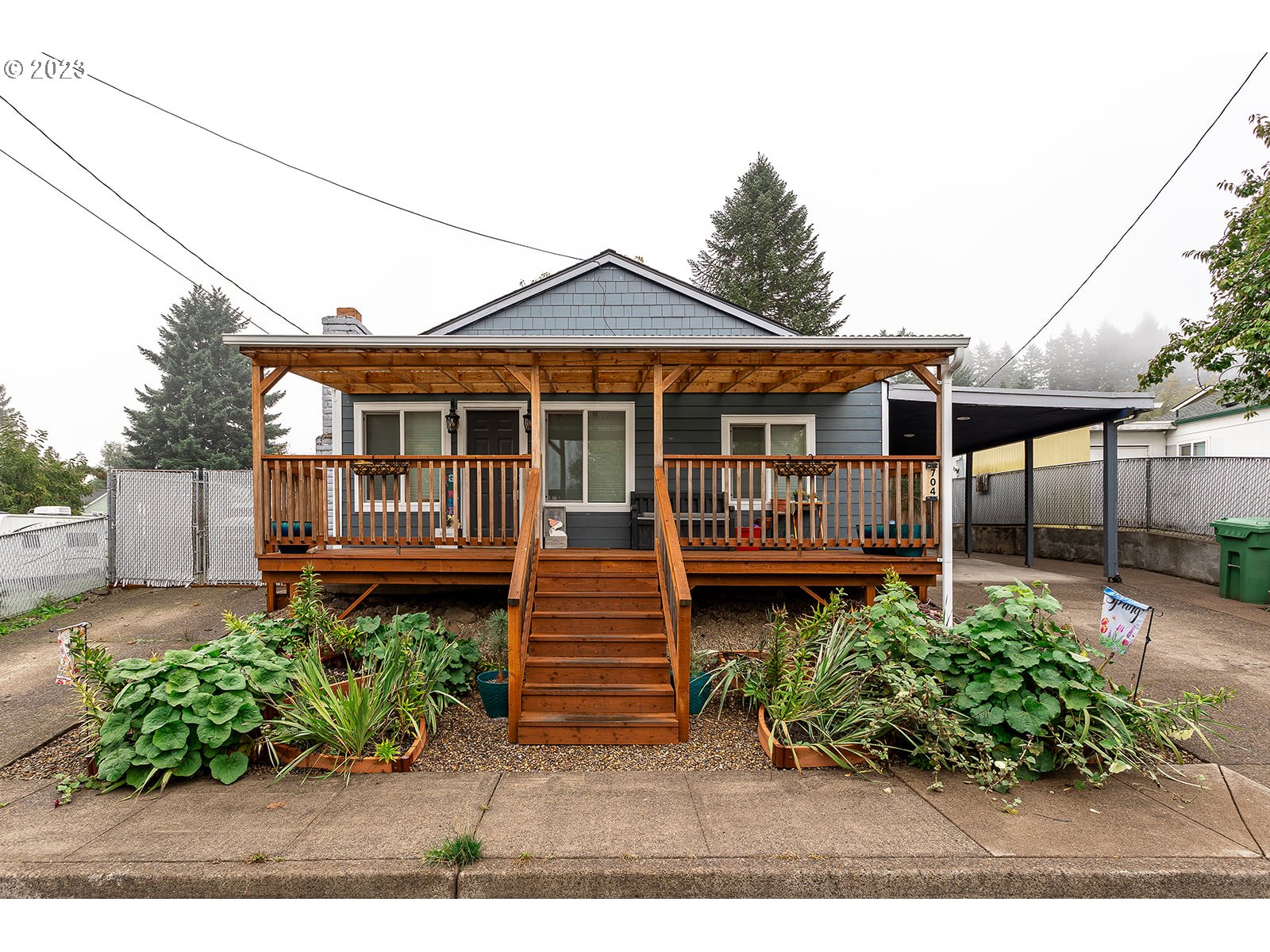 704 S 13TH ST Cottage Grove, Oregon Open House 11/11/23 @ 11Am-2PM!Charming bungalow in the heart of Cottage Grove! As you walk up your covered front porch you enter in to the front living space. There are two bedrooms in the front, or you can continue on in to the kitchen. Flooring in kitchen, front room & bathroom have been updated. Large bathroom lends plenty of place for storage. 3rd guest bedroom and large bonus room in the back of the home w/separate office space, laundry area and door to fenced backyard. separate room through small breezeway is finished w/electricity. newly leveled yard. Room to park your boat/trailer. Additional shed w/electricity & heat. New roof, New windows & new siding. 2 driveways & 1 carport area.