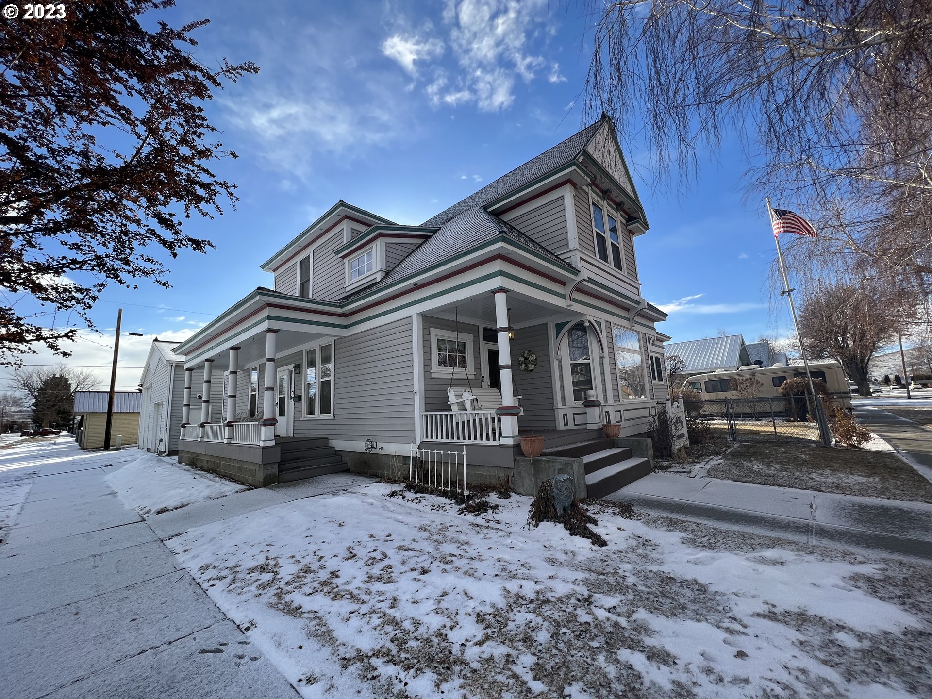 Truly historic Baker City! This five bedroom, three bath home is the ideal combination of both a heritage home and all the modern amenities.  Well suited for both personal living space and a potential Airbnb business, this classic home includes a private patio and yard with adjacent 32' x 56' shop that includes full RV parking and an enclosed workshop.  Whether entertaining indoors and out, or enjoying the evening sitting out on the side porch, past and present come together here in Baker City!