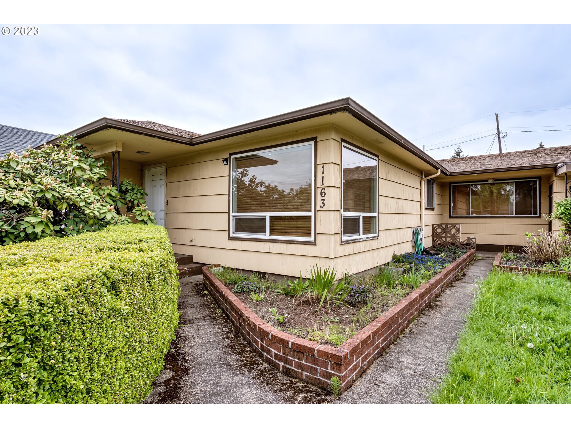 1163 D ST Springfield, Oregon Large fixer-upper property that offers a lot of potential for renovation and customization. The property has a mid-century modern style and boasts a spacious layout that includes 3 large bedrooms and two large living spaces, providing ample space for comfortable living.The property also includes a large shed that can be used for storage or hobbies, and a spacious yard that is perfect for outdoor entertaining or relaxation. Additionally, the property has potential for dual living or a second unit, providing a great investment opportunity.The location of the property is ideal, as it is situated near the Washburn Historic District, which is known for its rich history and charming architecture. This location is perfect for those who value a sense of community and appreciate the character of historic neighborhoods.While the property needs some work, it offers a unique opportunity to create a space that is truly your own. With some creativity and effort, this property can be transformed into a beautiful and functional home that meets all of your needs and more.