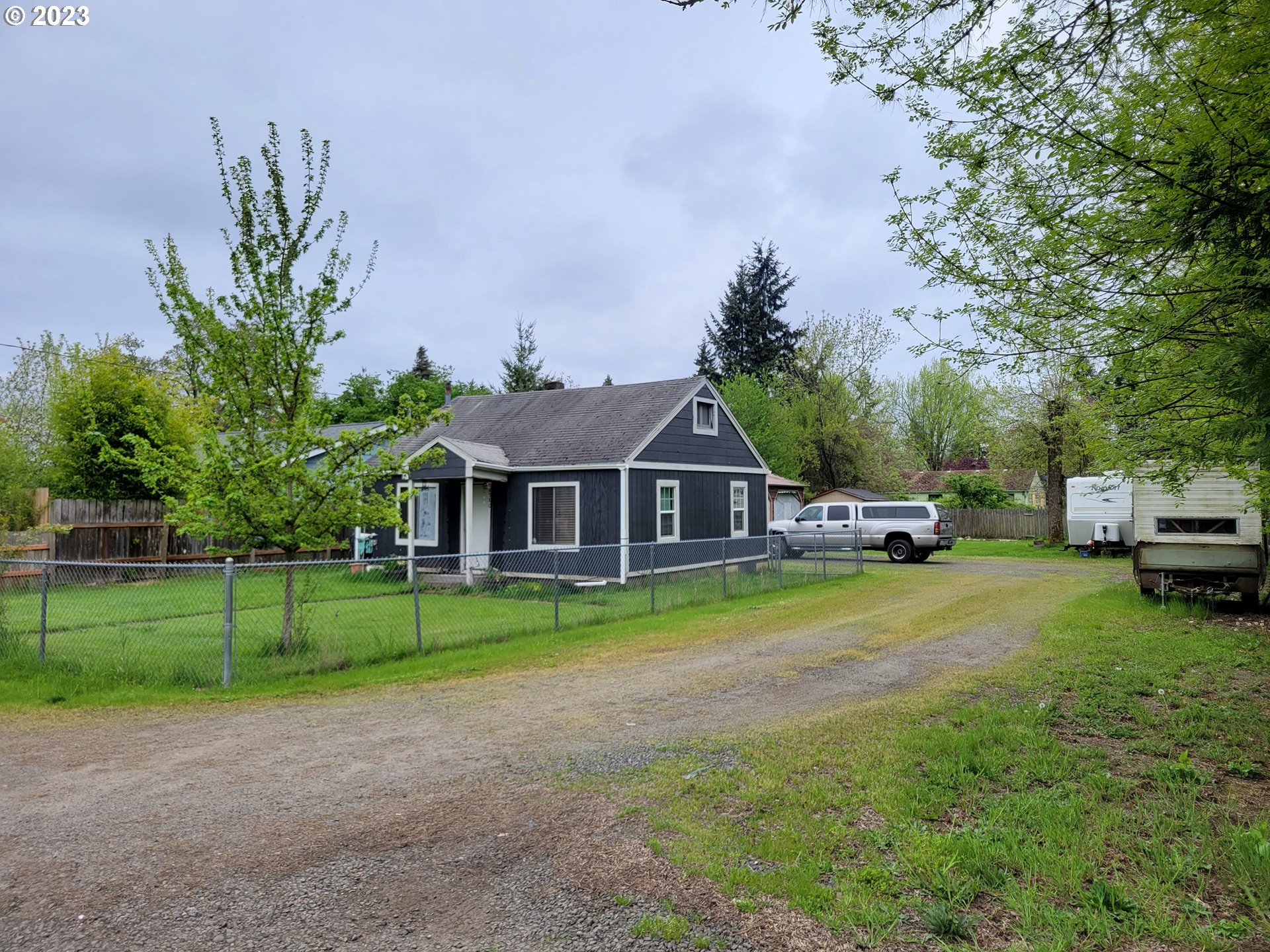 Investment opportunity! Large 0.34 acre lot could have potential for multi units and/or lots. Buyer to do due-diligence with city for permitted uses and developments. RLID says 3 bedroom, but is only one bedroom with finished attic. Home is needing major repairs or replaced. Sold as-is.